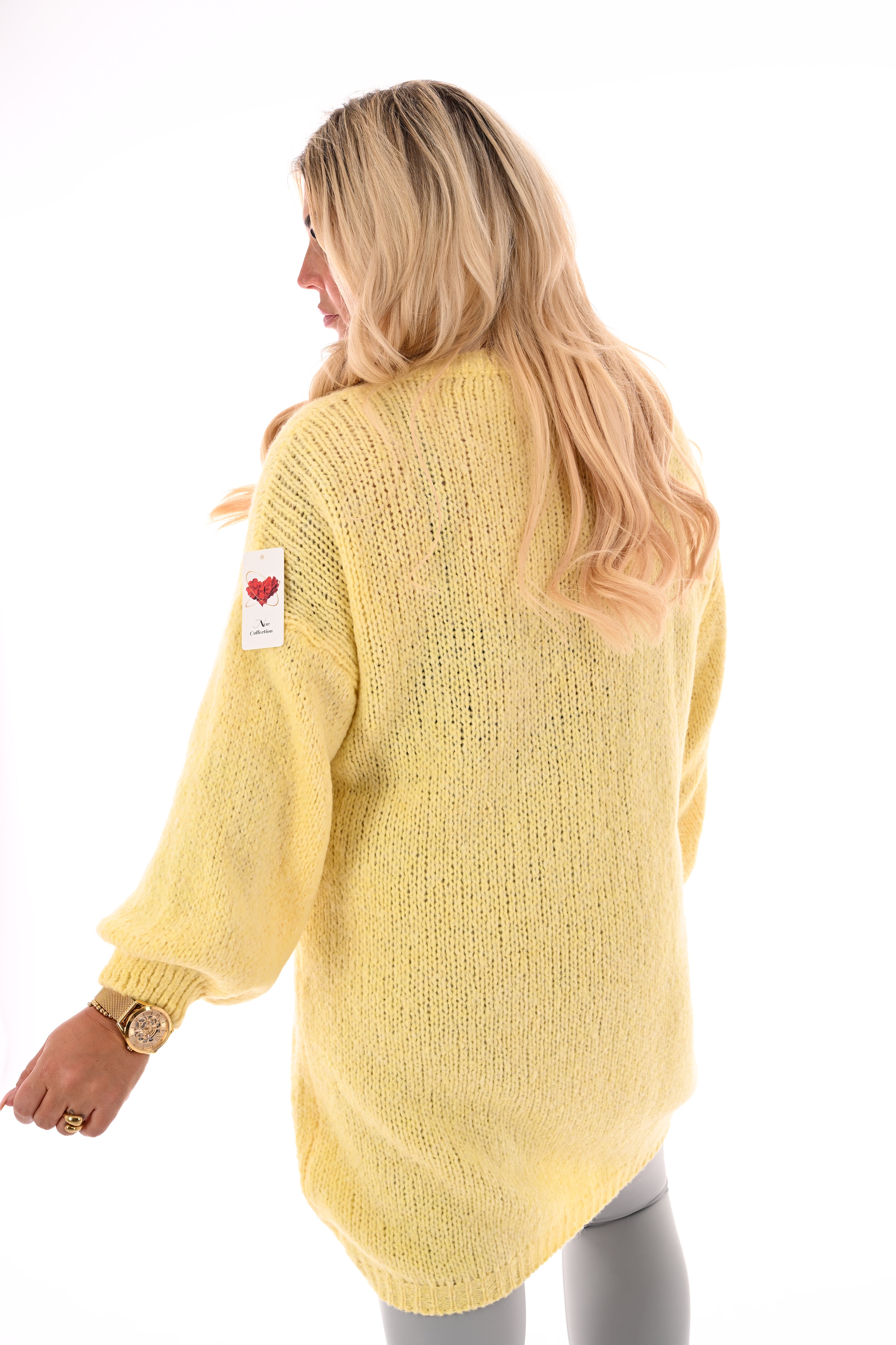 Lange gebreide trui pofmouwen geel