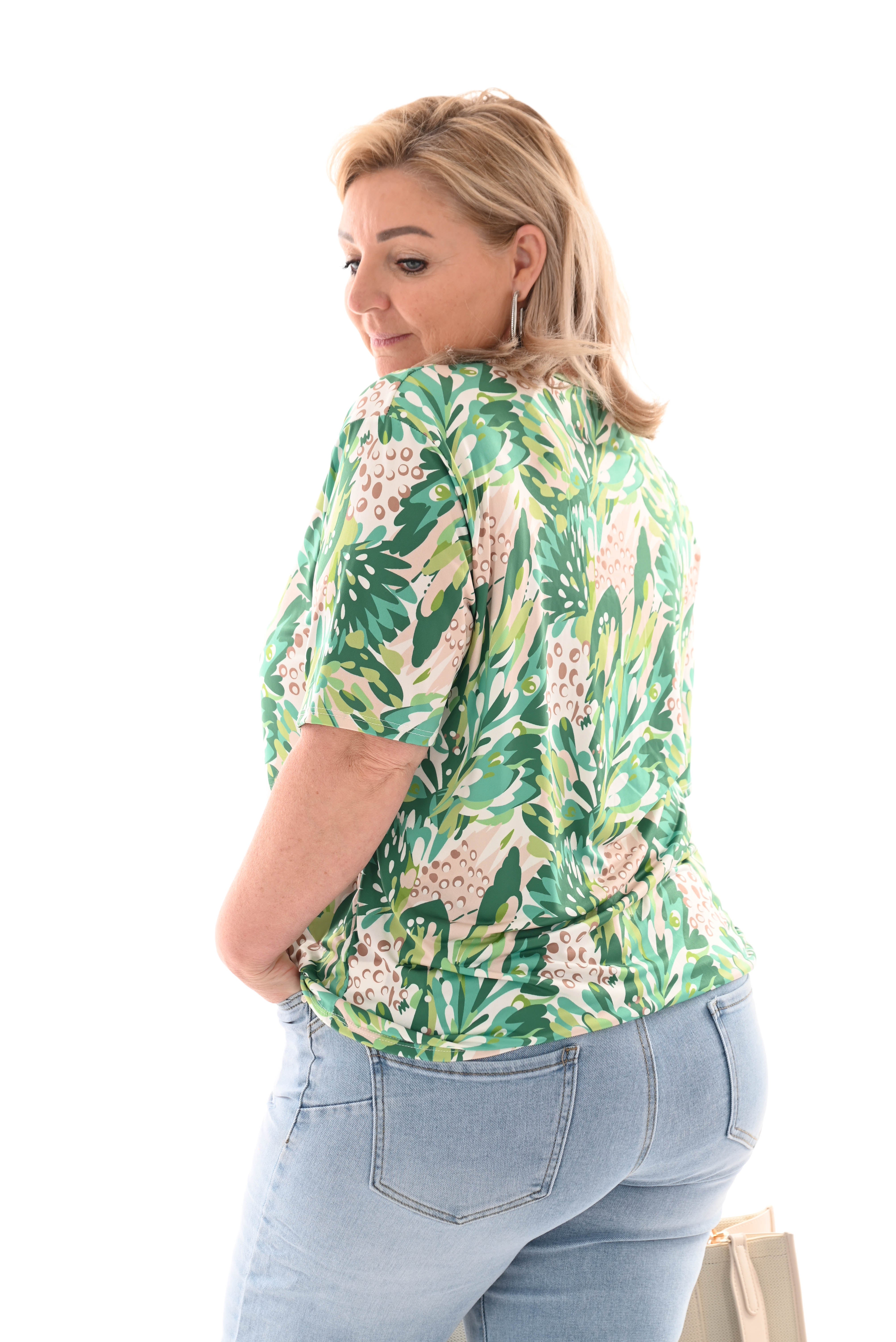 Travel top met rits bladeren groen