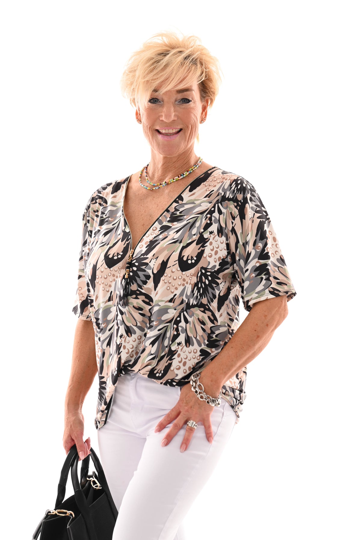 Travel top met rits bladeren zwart/beige