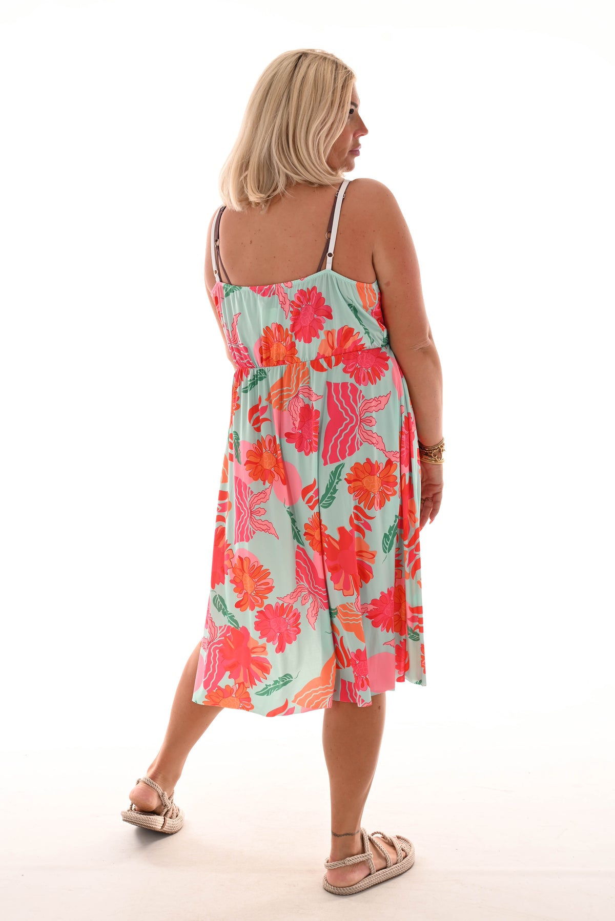 Korte jurk spaghetti bandjes bloemen print lichtblauw