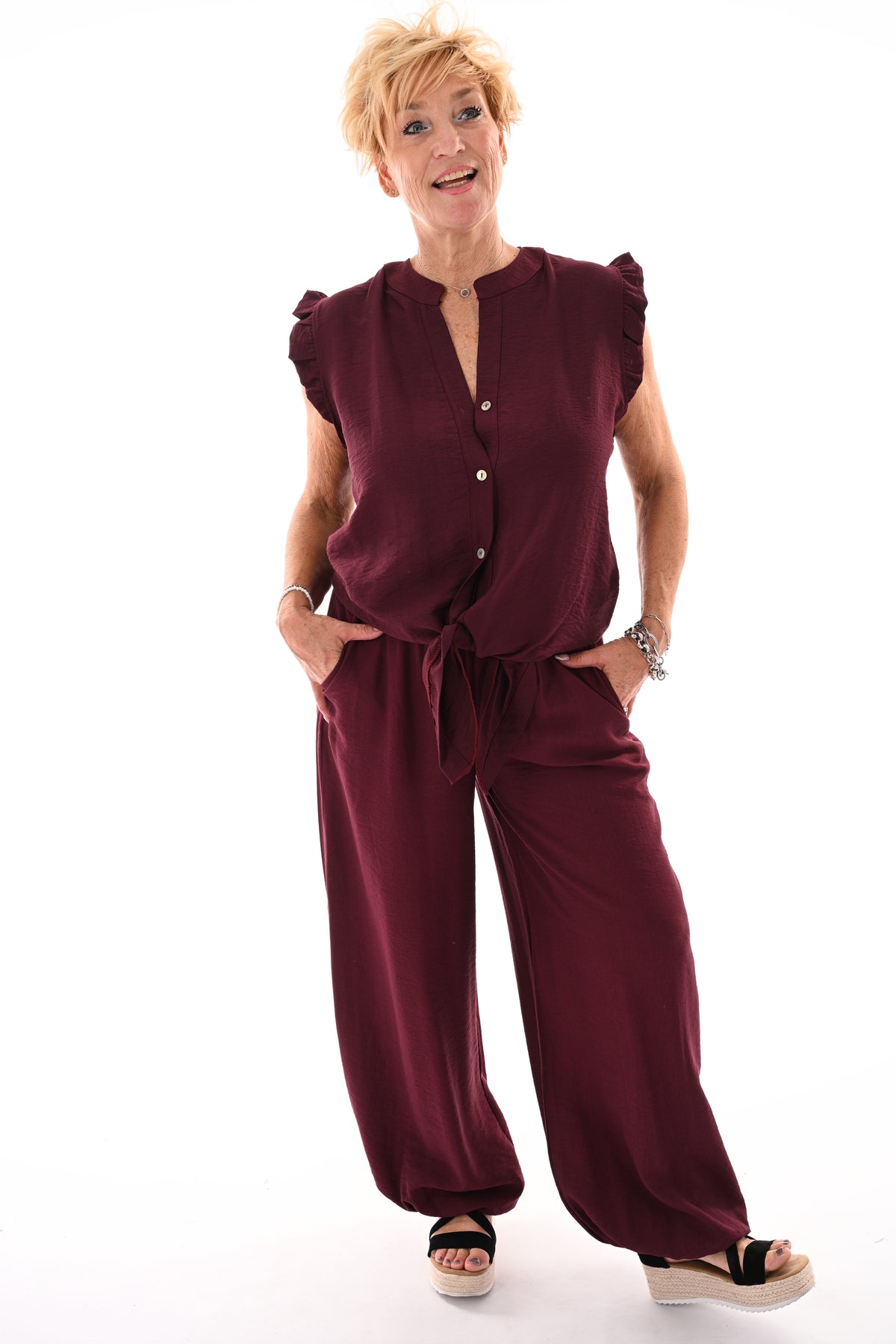 Tweedelig set mouwloos met knoop aubergine