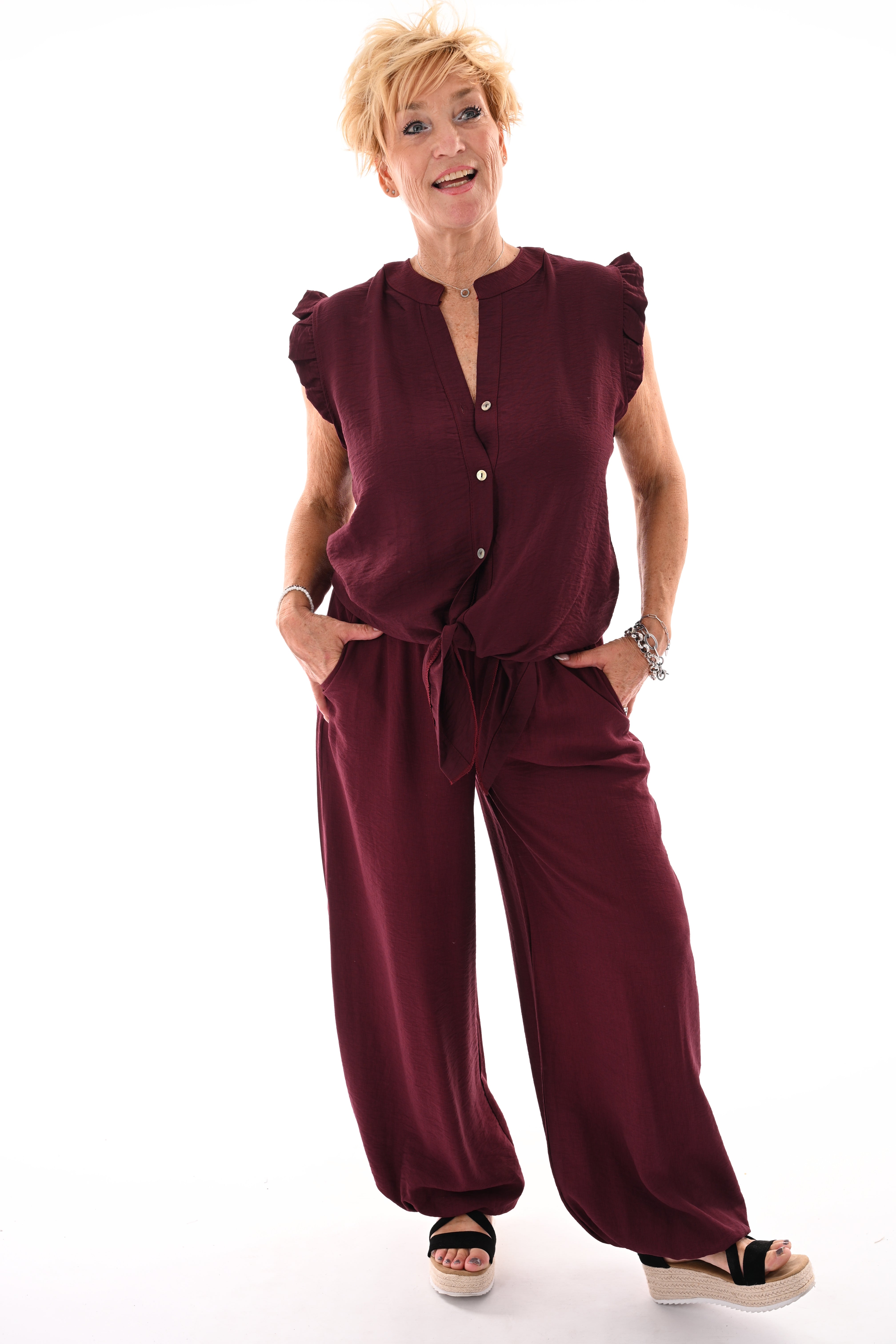 Tweedelig set mouwloos met knoop aubergine