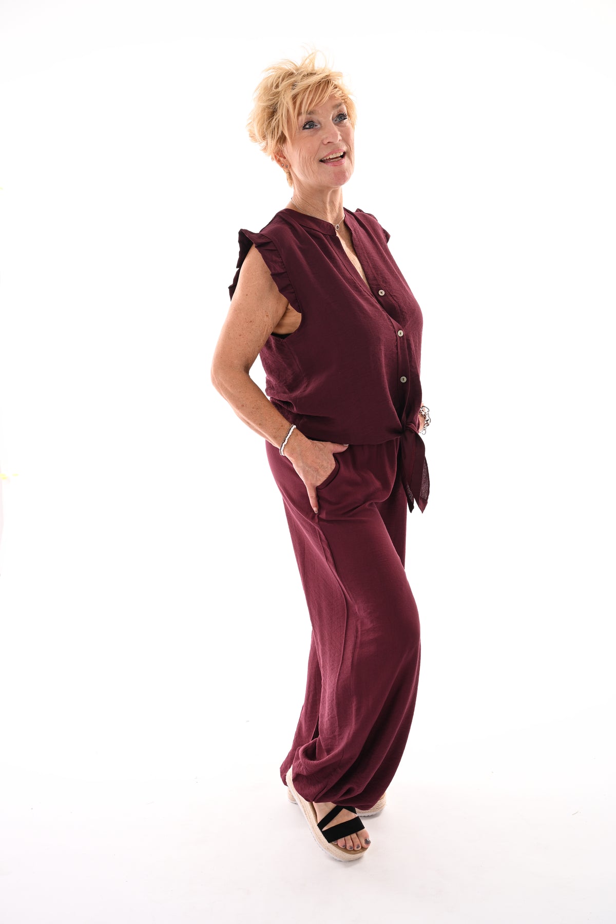 Tweedelig set mouwloos met knoop aubergine