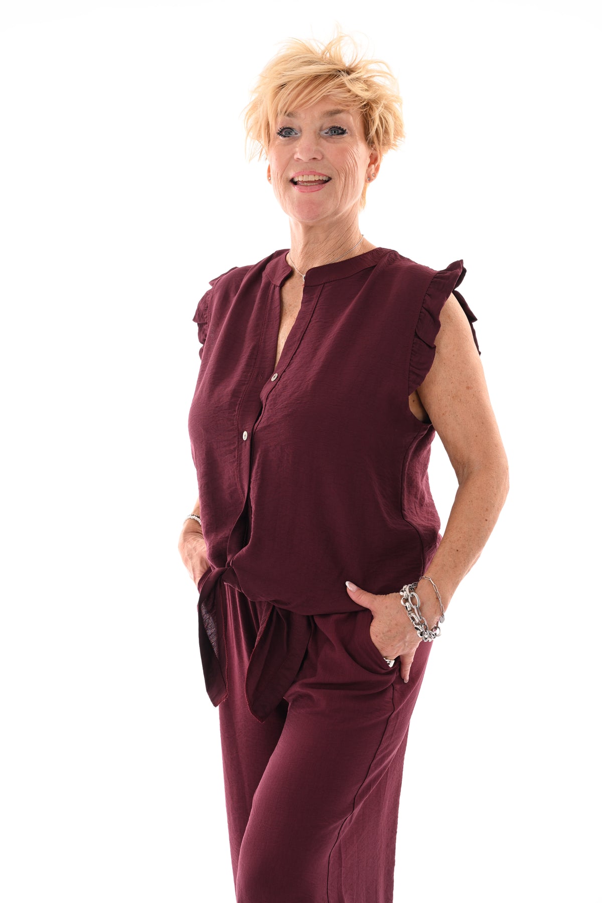 Tweedelig set mouwloos met knoop aubergine