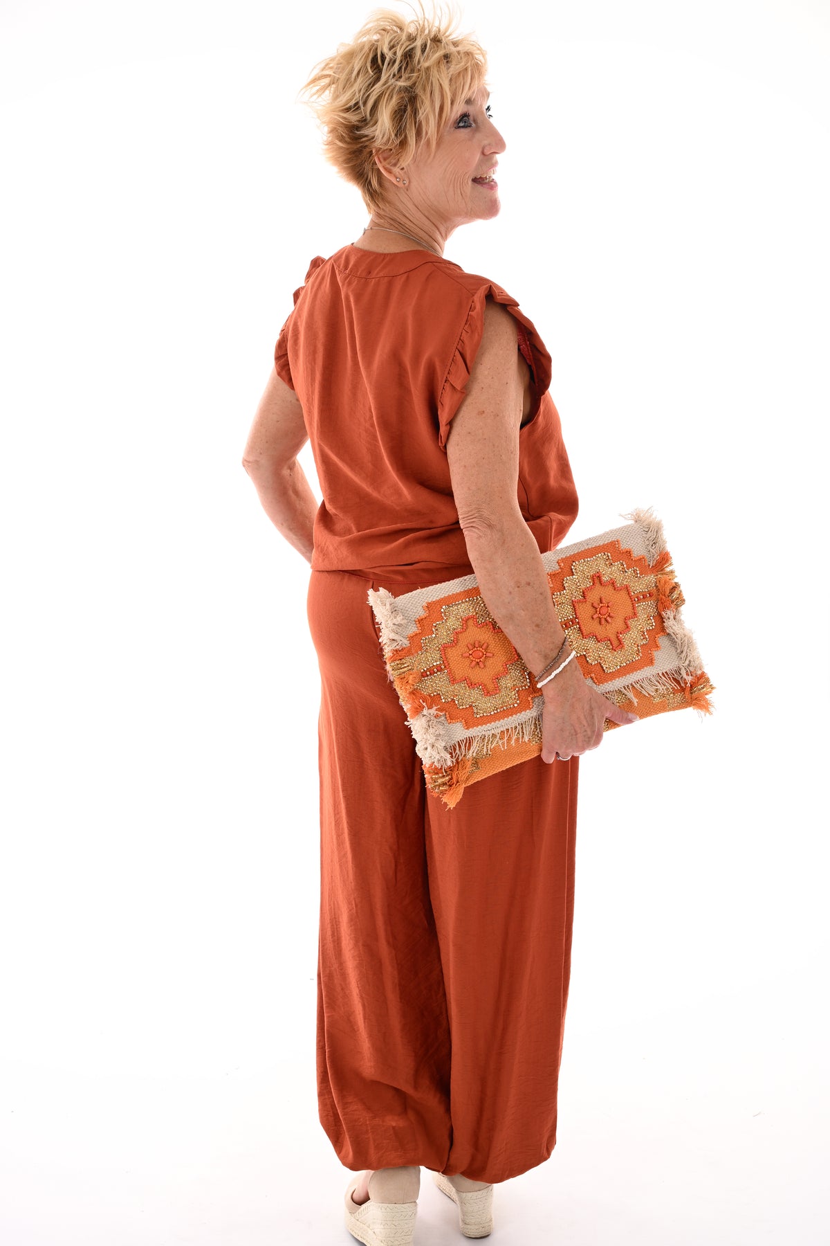 Tweedelig set mouwloos met knoop brique