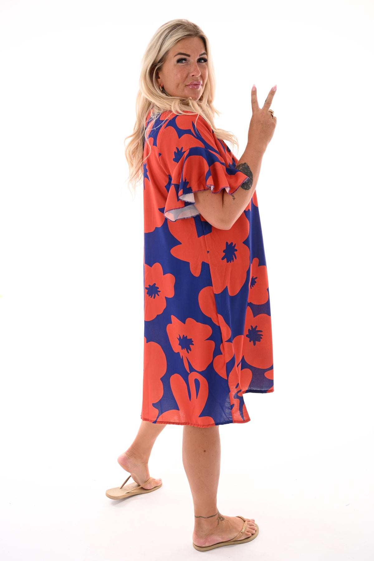 Jurk v-hals korte roezelmouwen print bloemen blauw/oranje