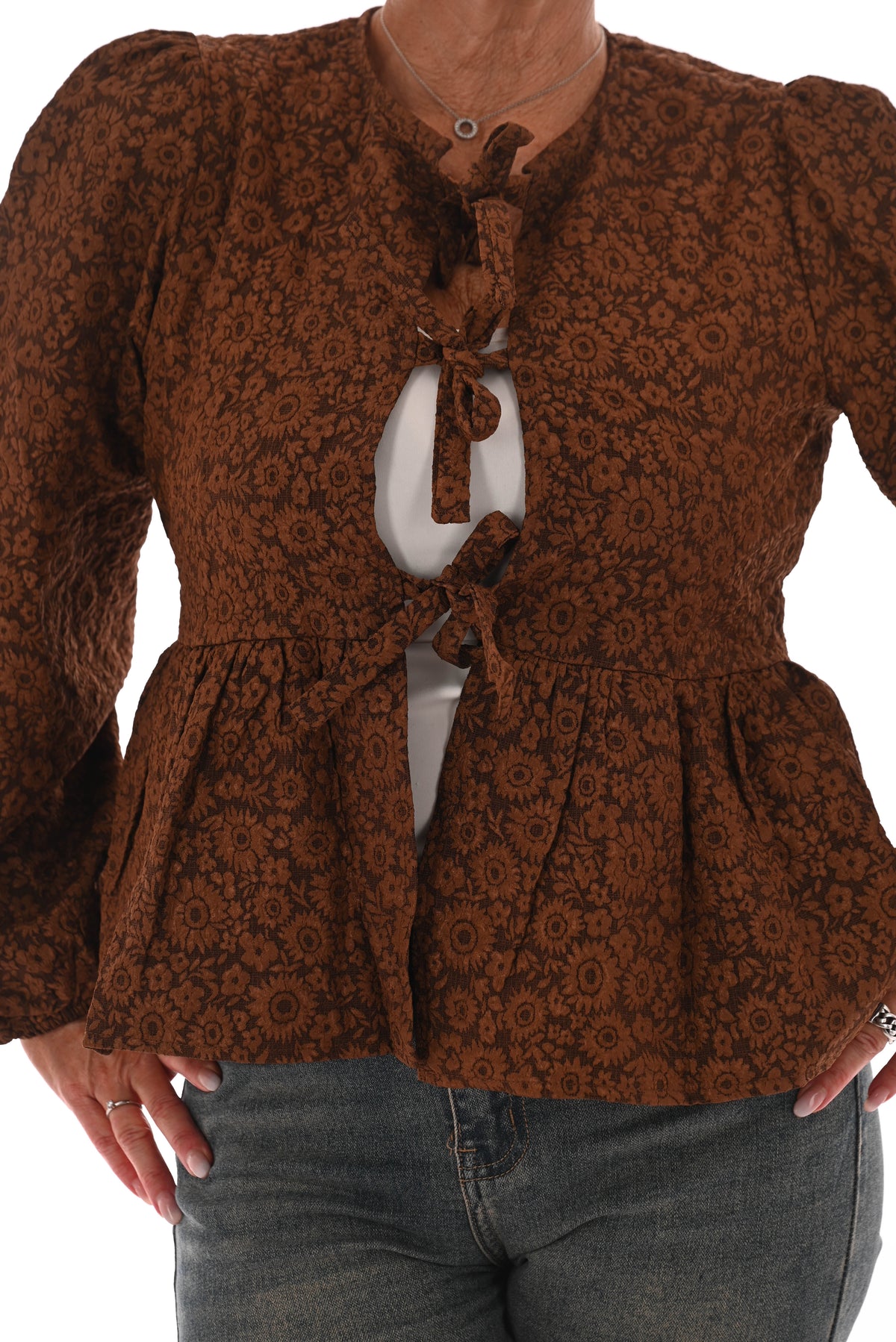 Strik blouse bloemen wijde uitloop bruin