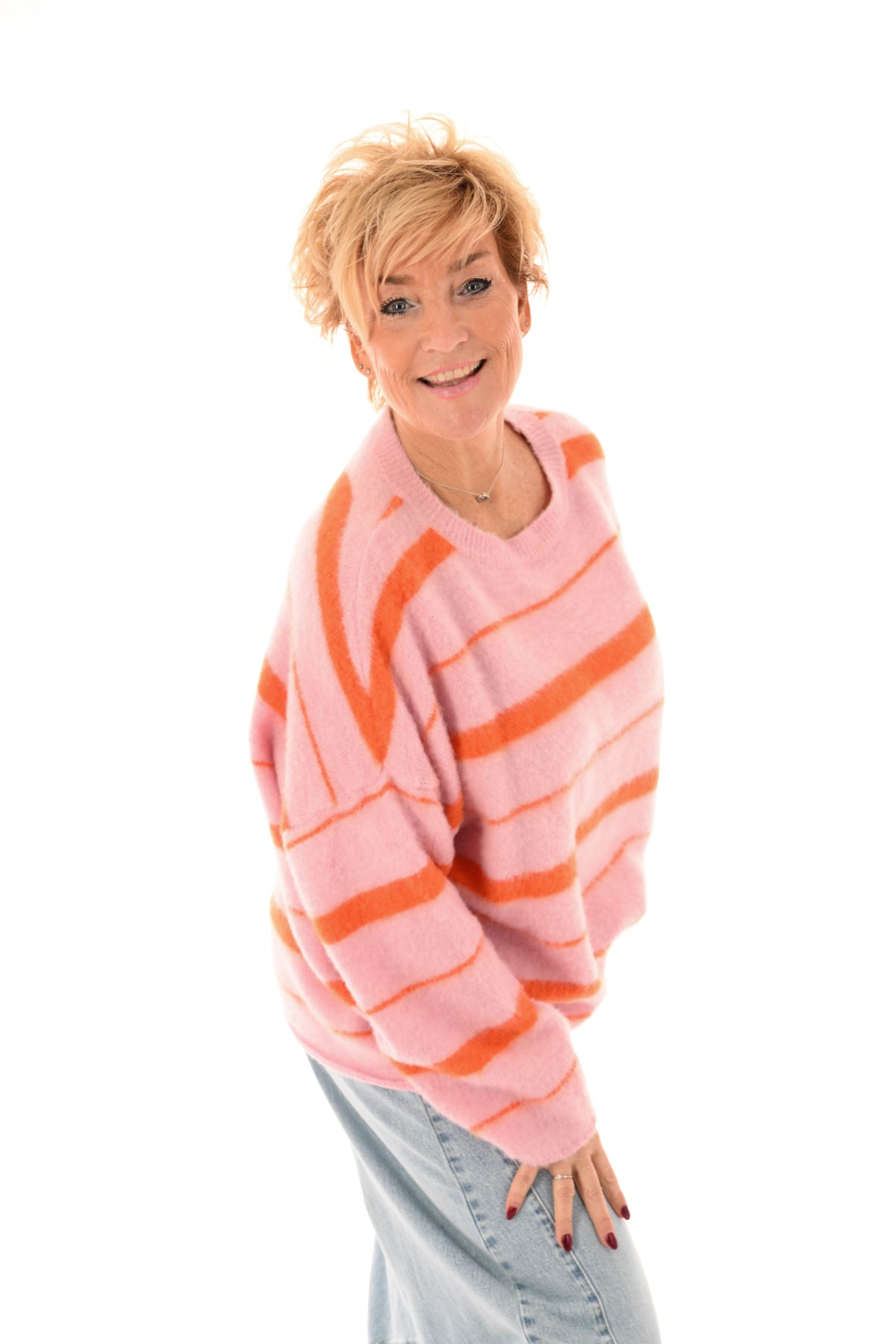 Zacht gebreide trui mix strepen lichtroze/oranje