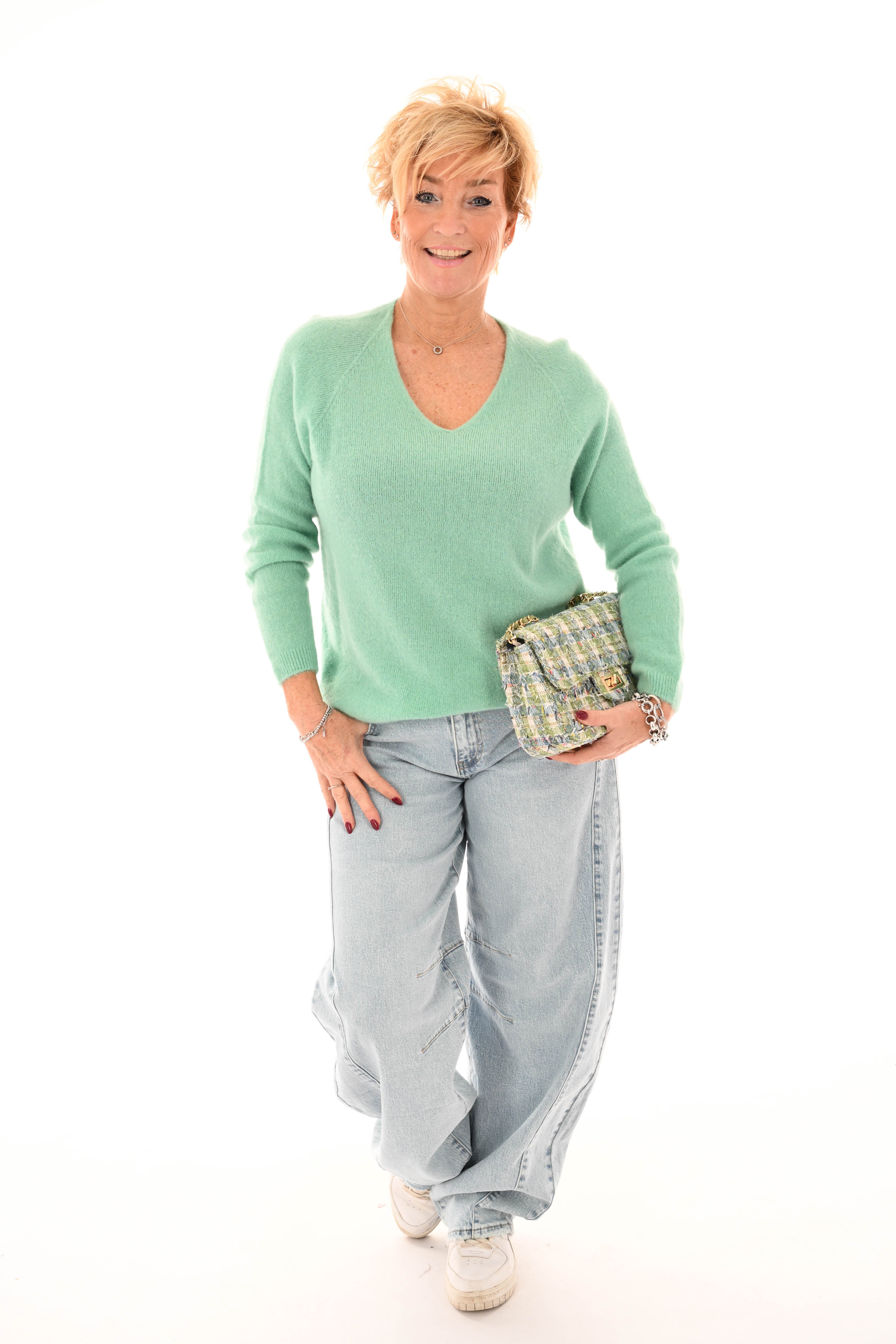 Fijn gebreide trui v-hals turquoise