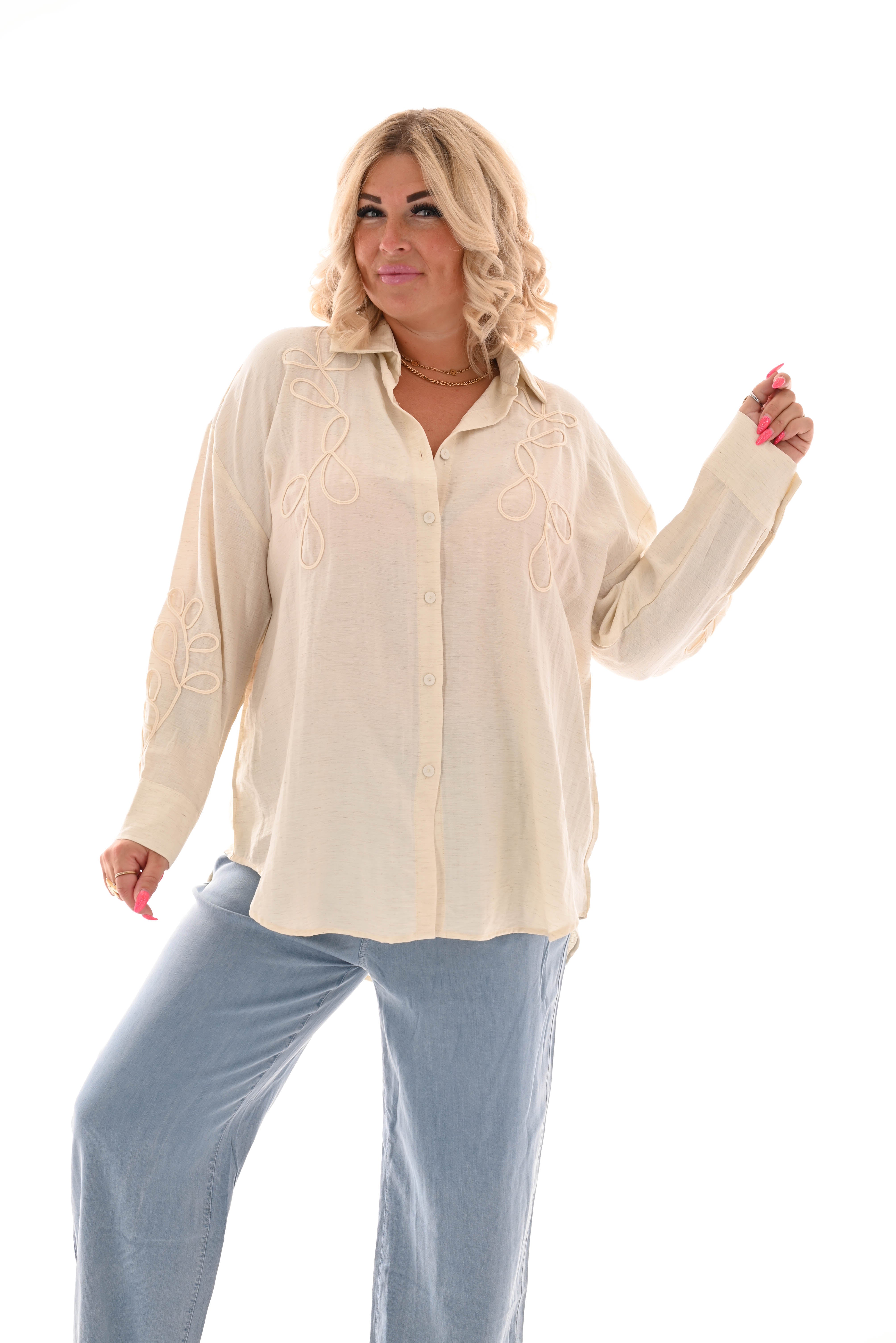 Blouse met borduursels creme