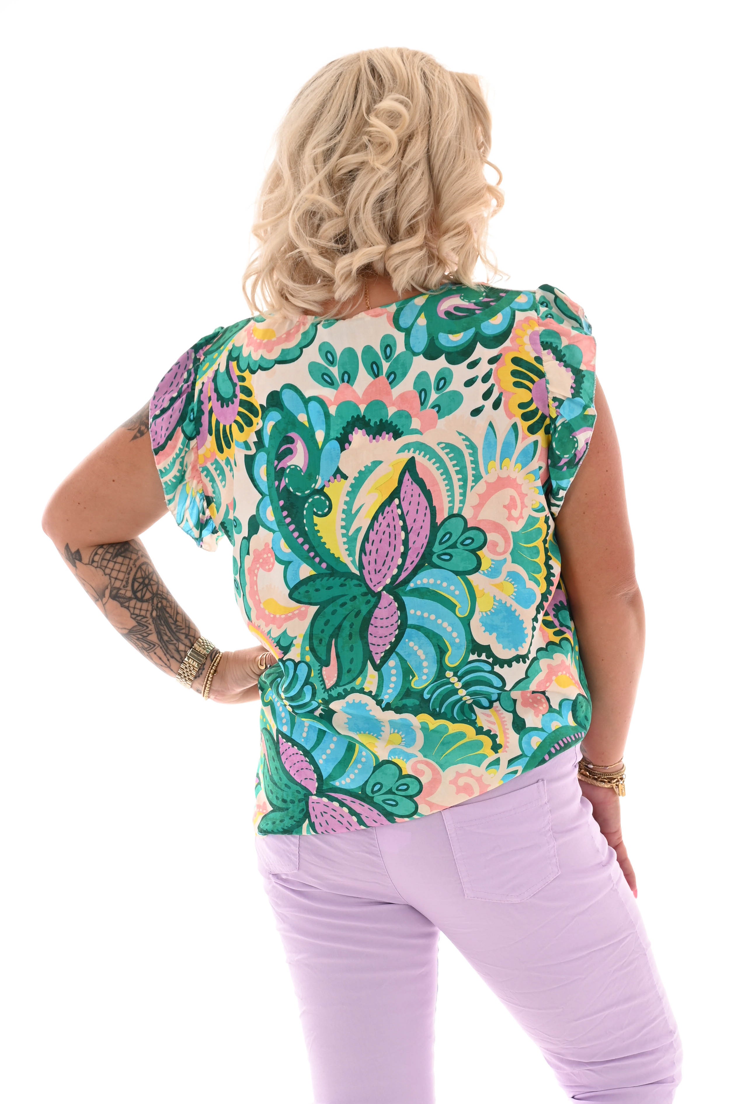 Top met roezel mouwen groen