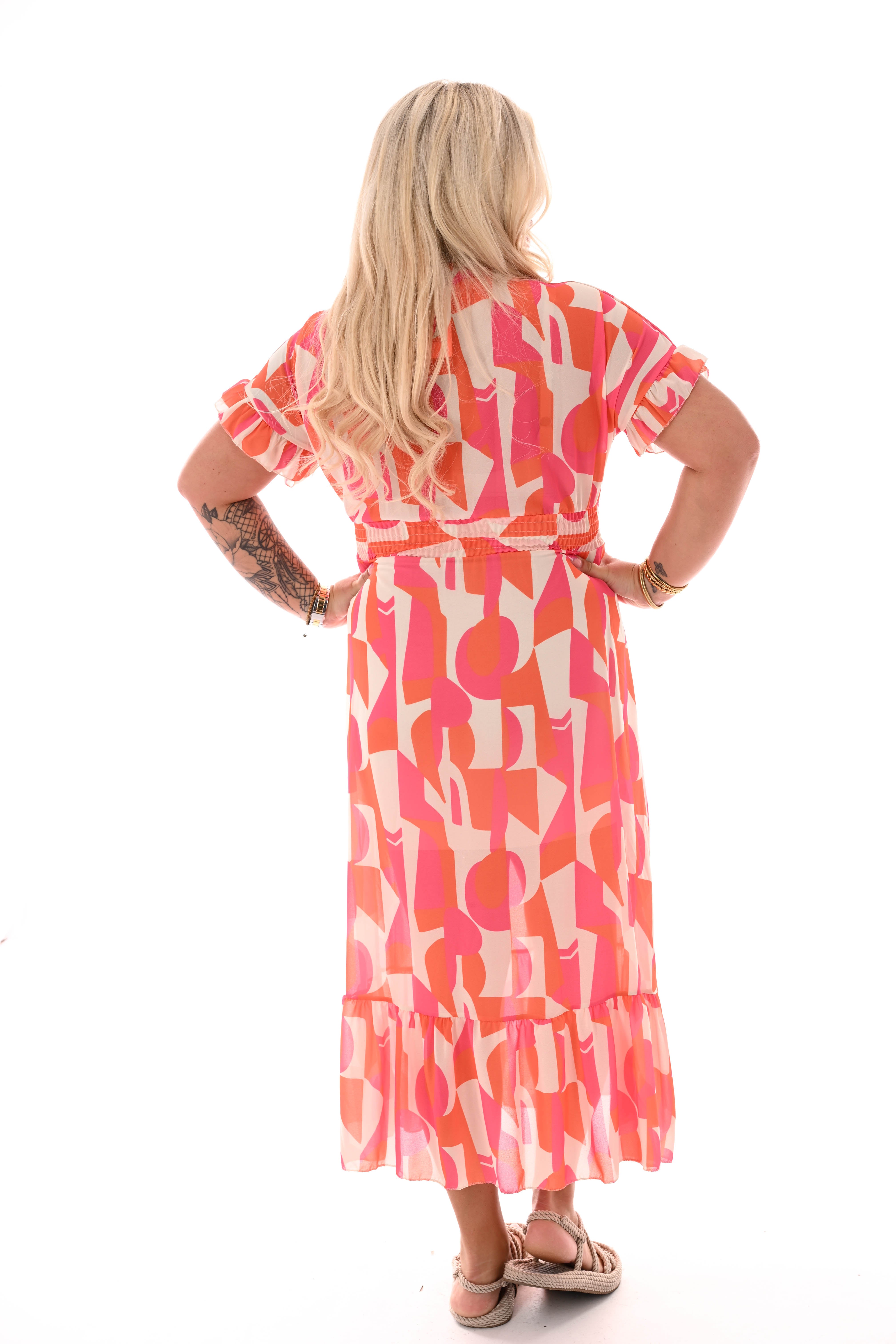Maxi roezel jurk v-hals print retro oranje/roze