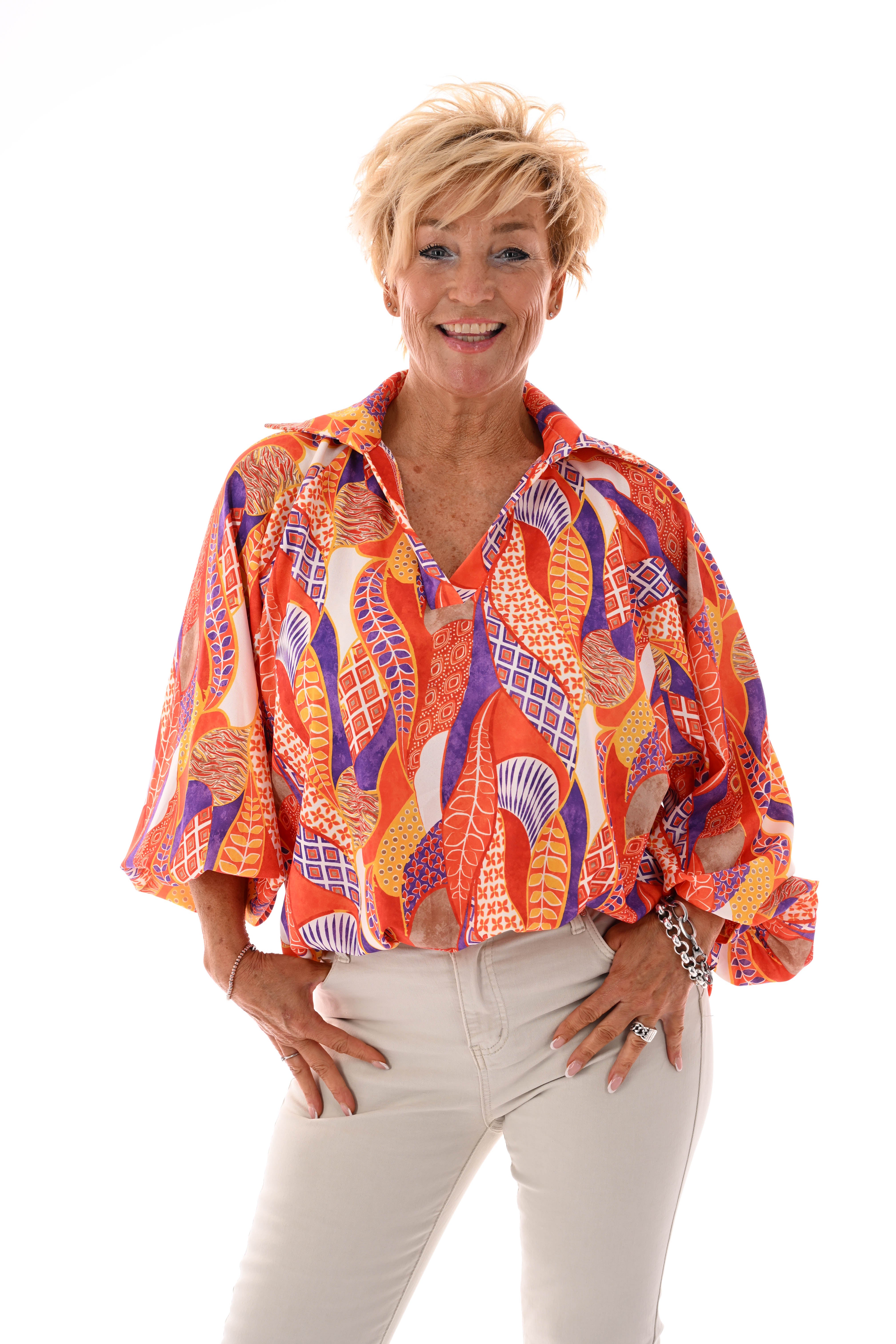 Blouse v-hals mixed print oranje