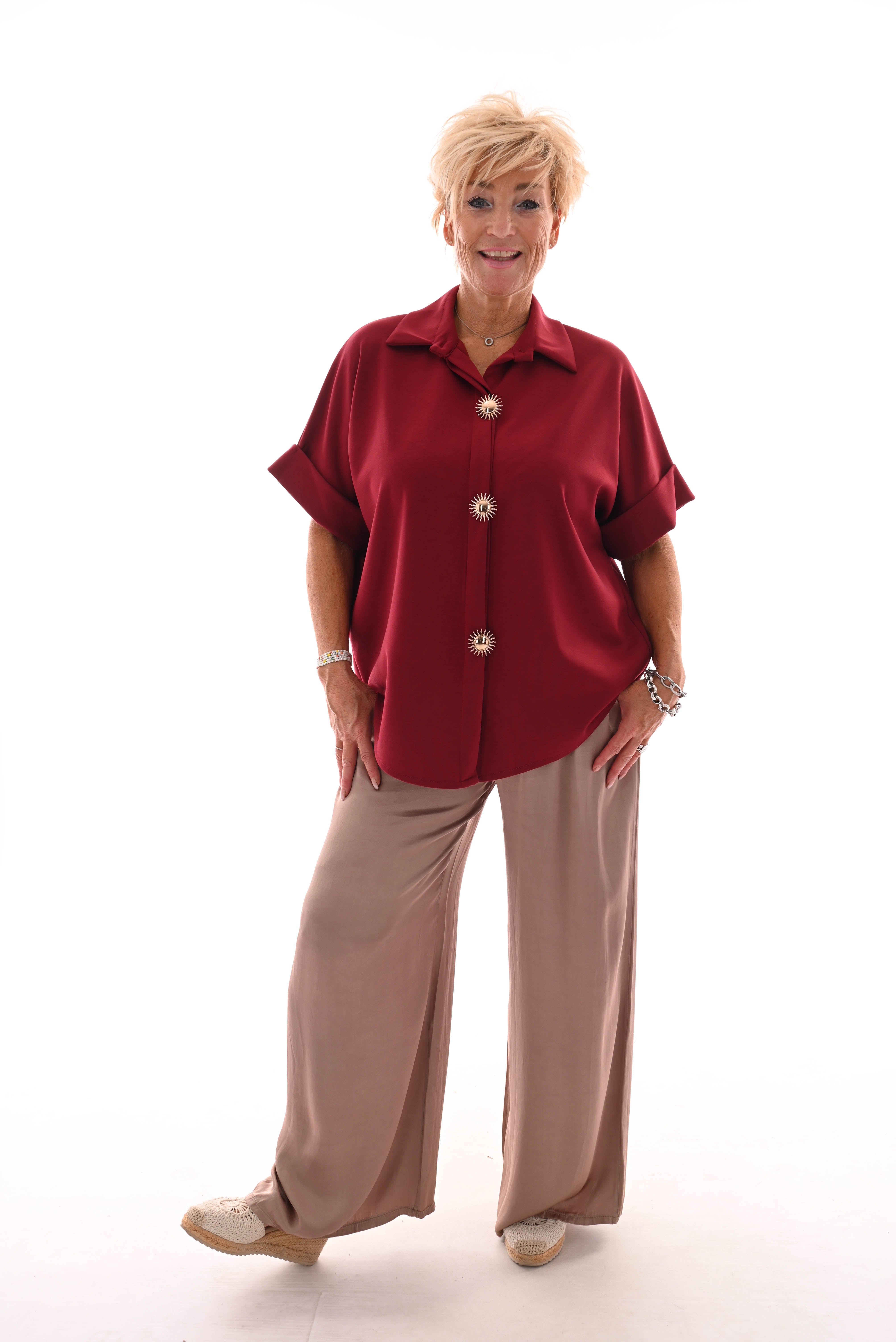Jogging doorknoop blouse broche zon rood