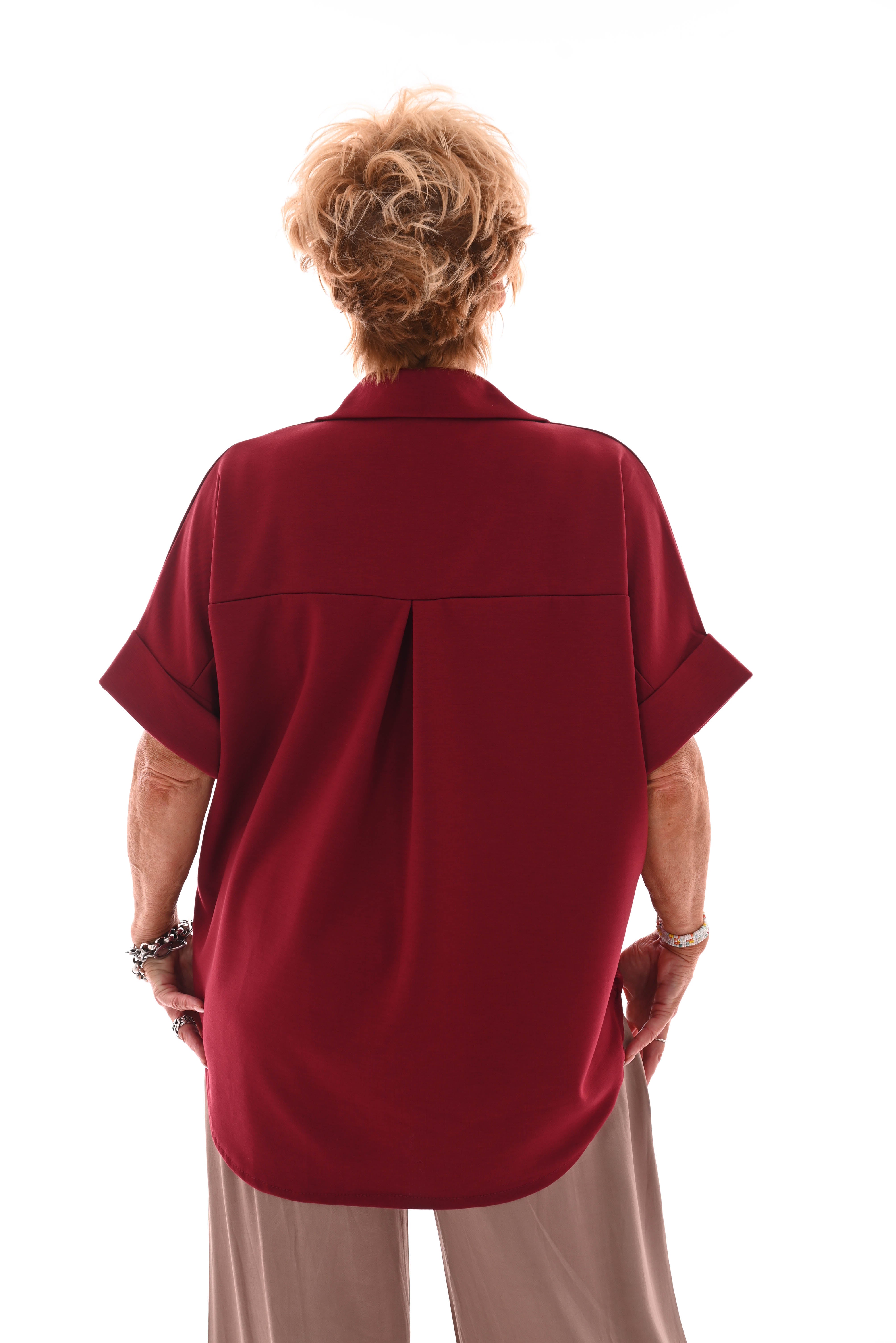 Jogging doorknoop blouse broche zon rood