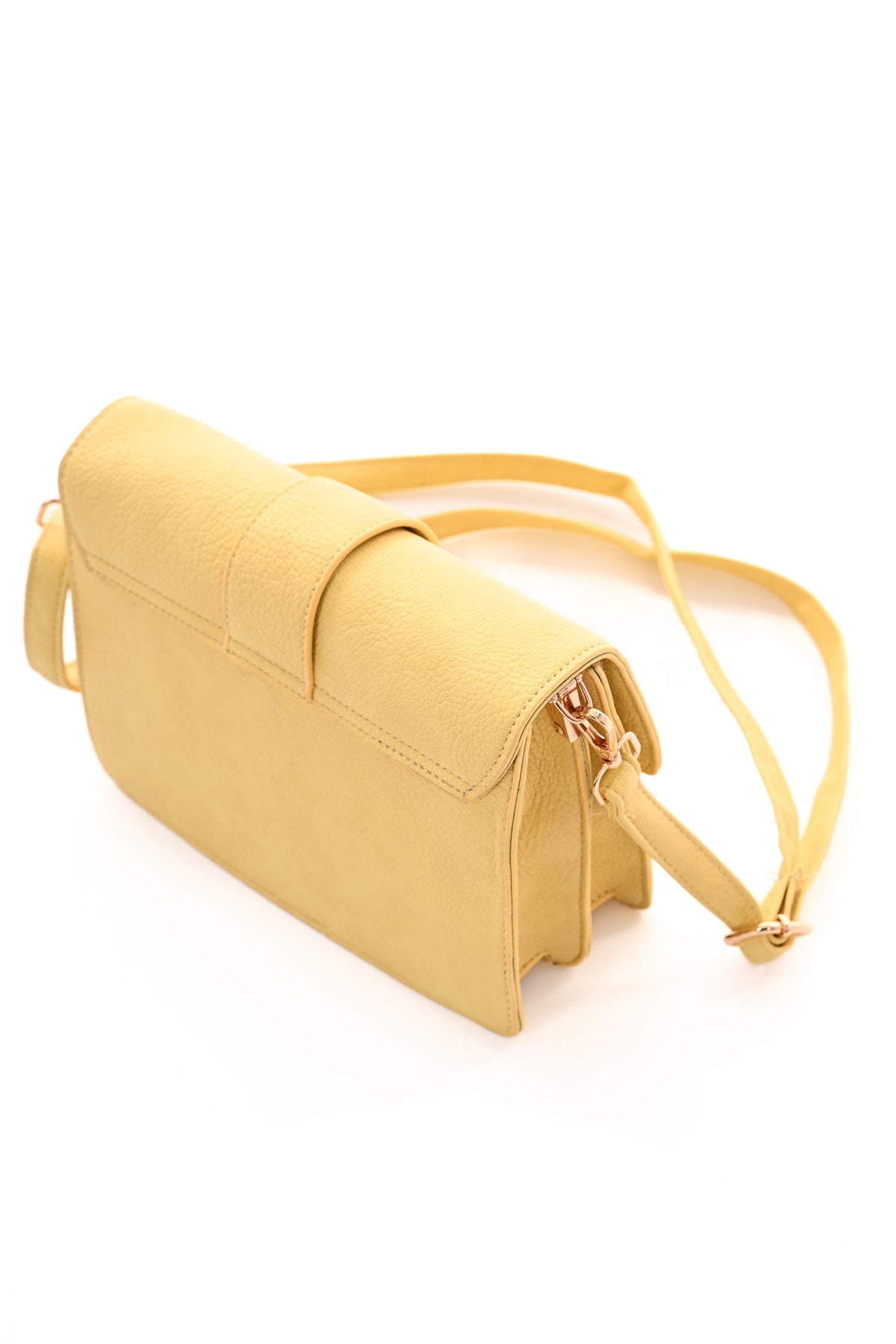 Kleine leren tas botergeel