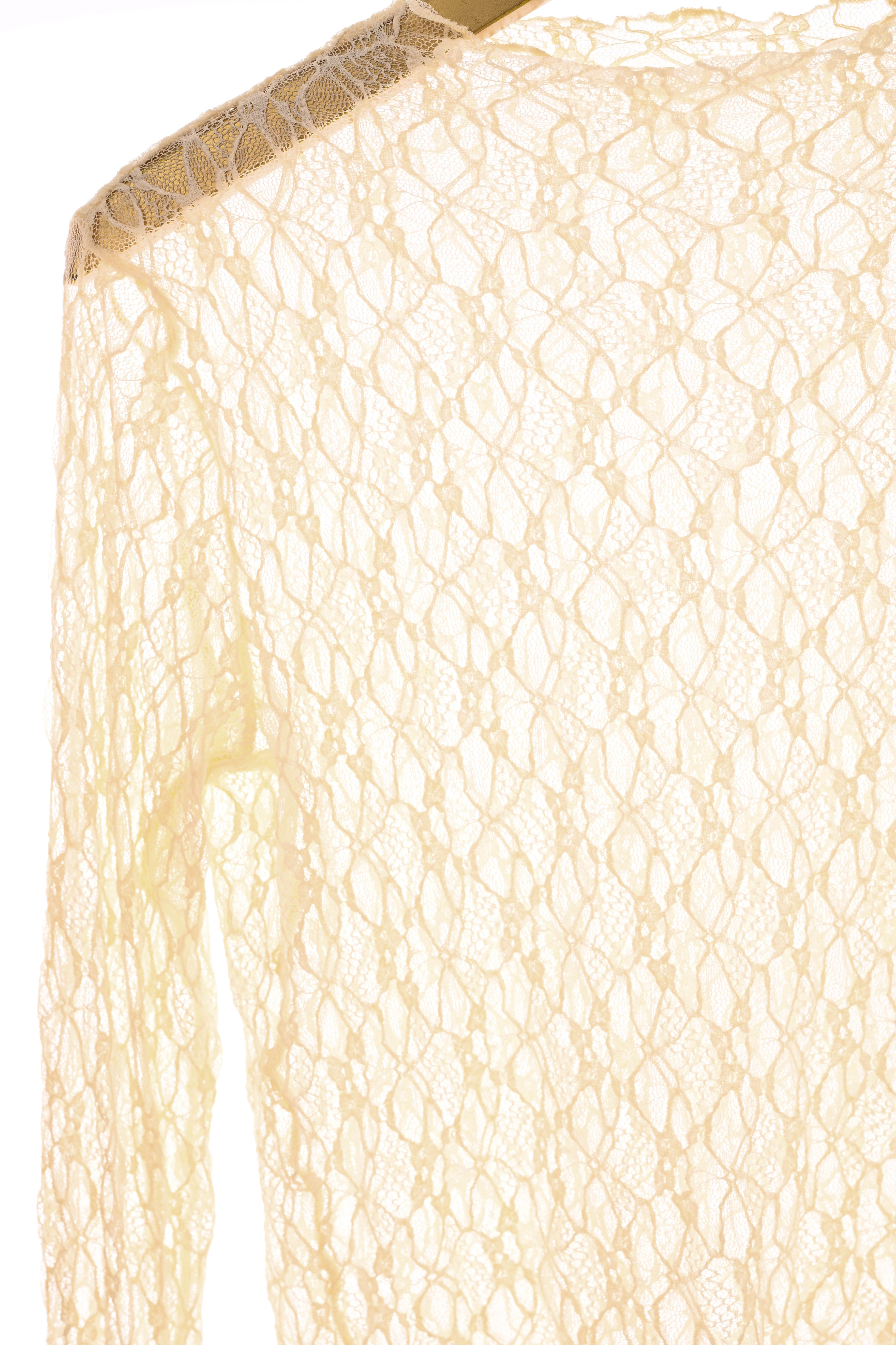 Kanten top trompetmouwen roomwit