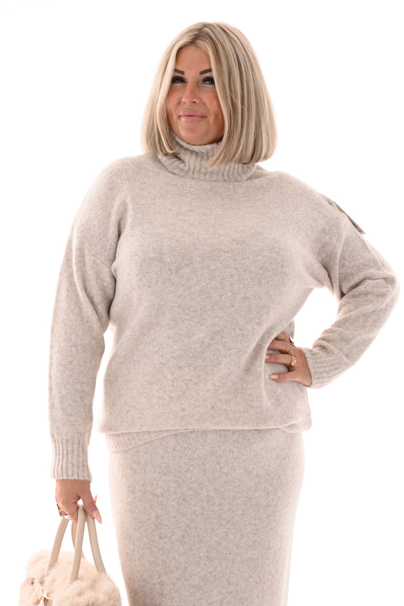Gebreid set coltrui met rok beige