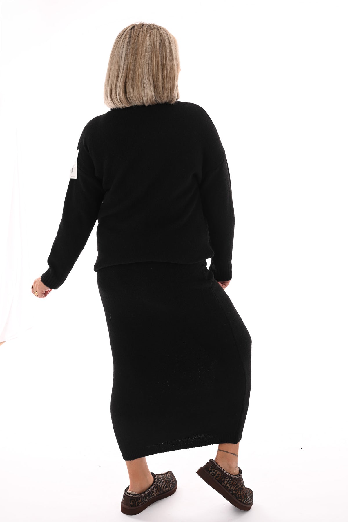 Gebreid set coltrui met rok zwart