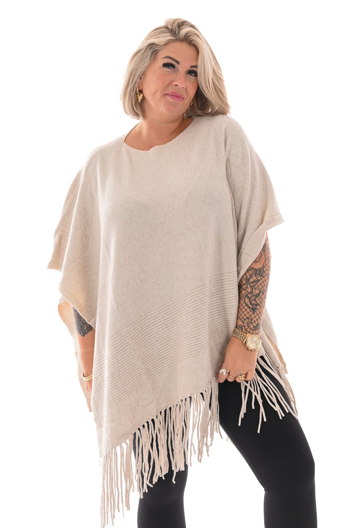 Poncho met franjes beige