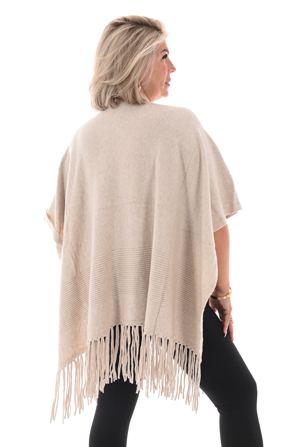 Poncho met franjes beige