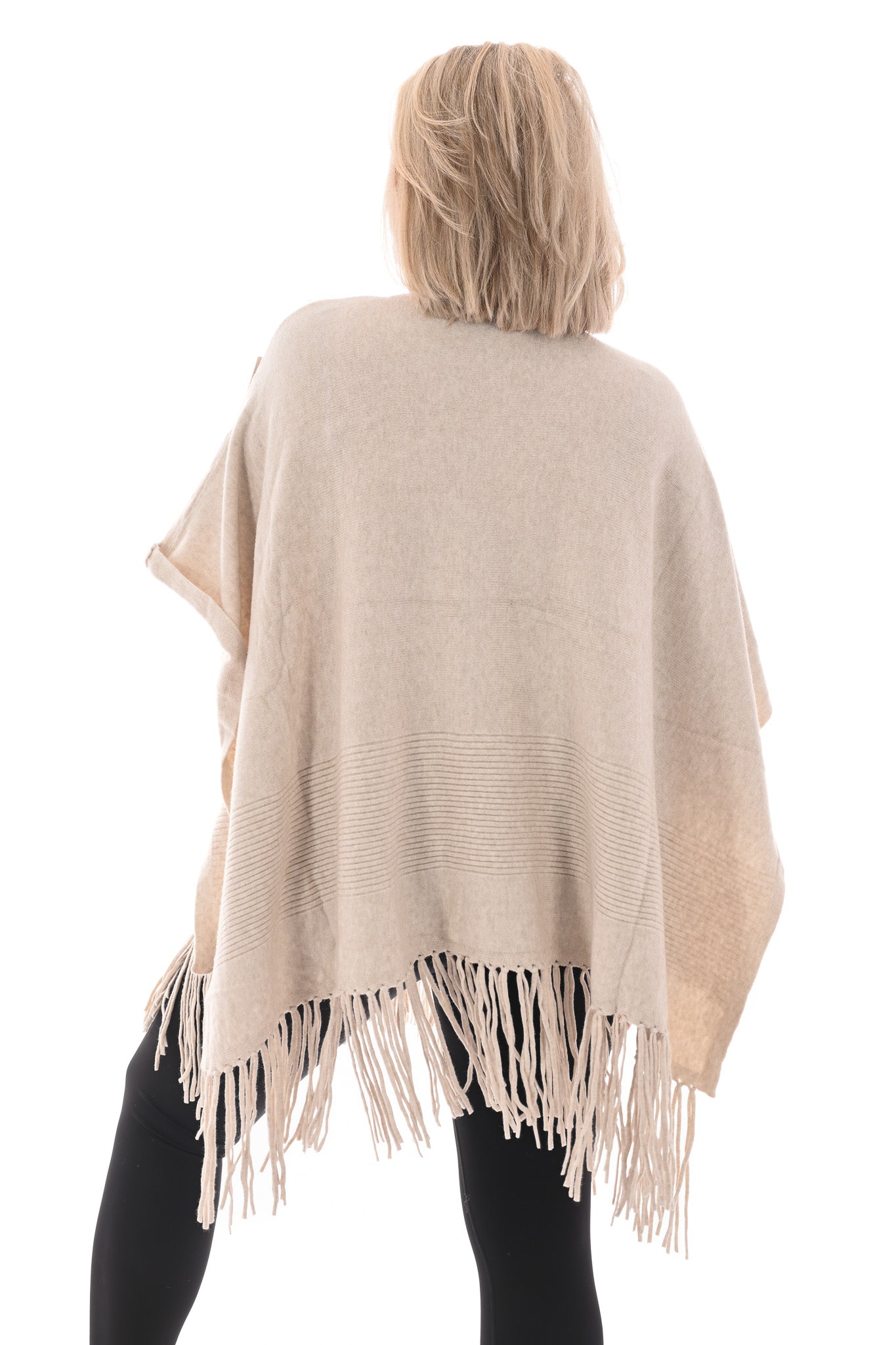 Poncho met franjes beige