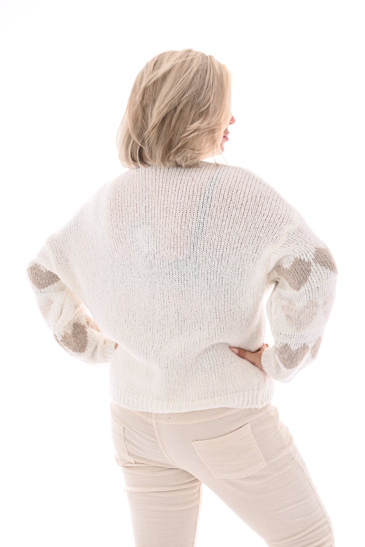 Fijn gebreid vest hartjes roomwit