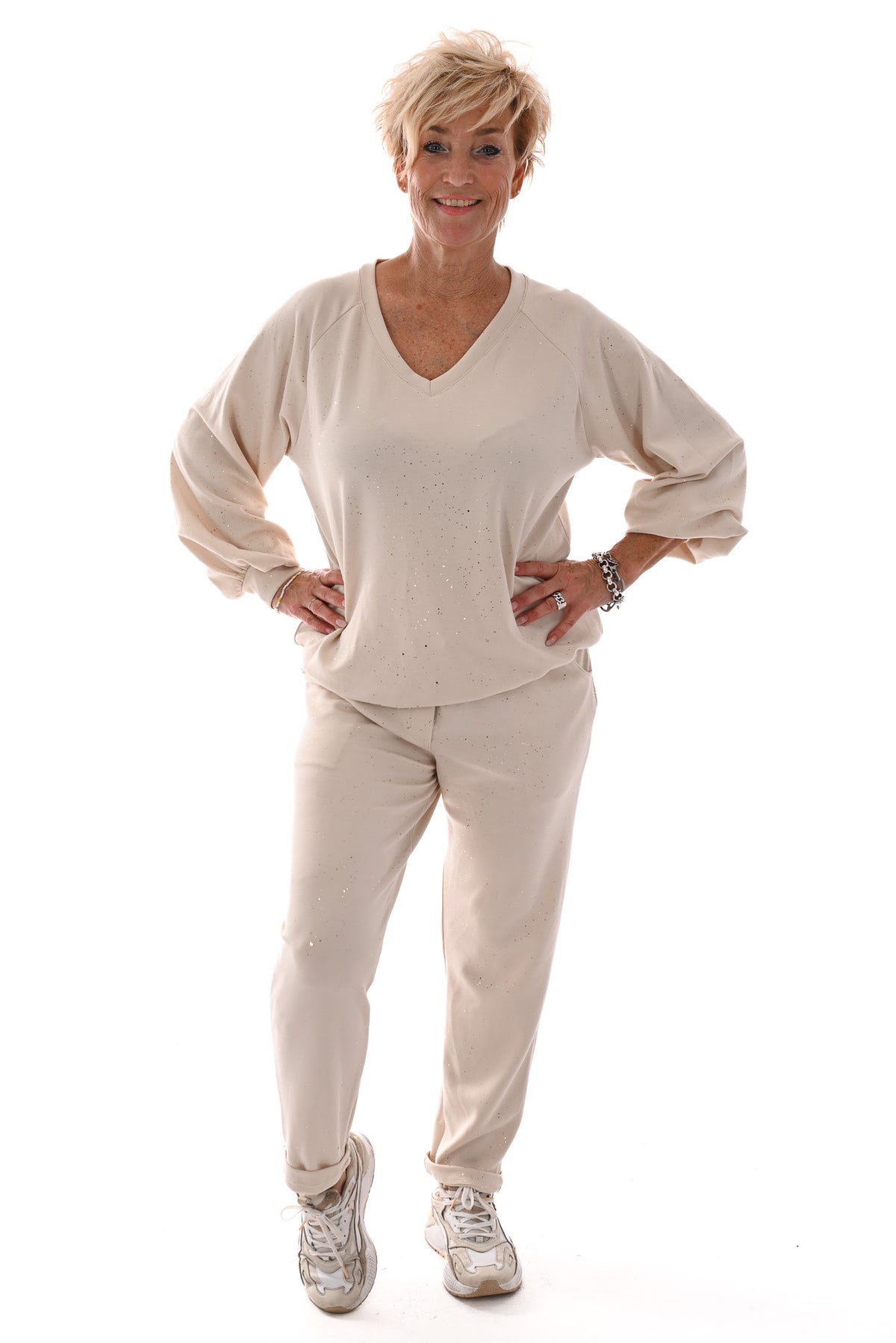 Tweedelig joggingset gouden glitter beige