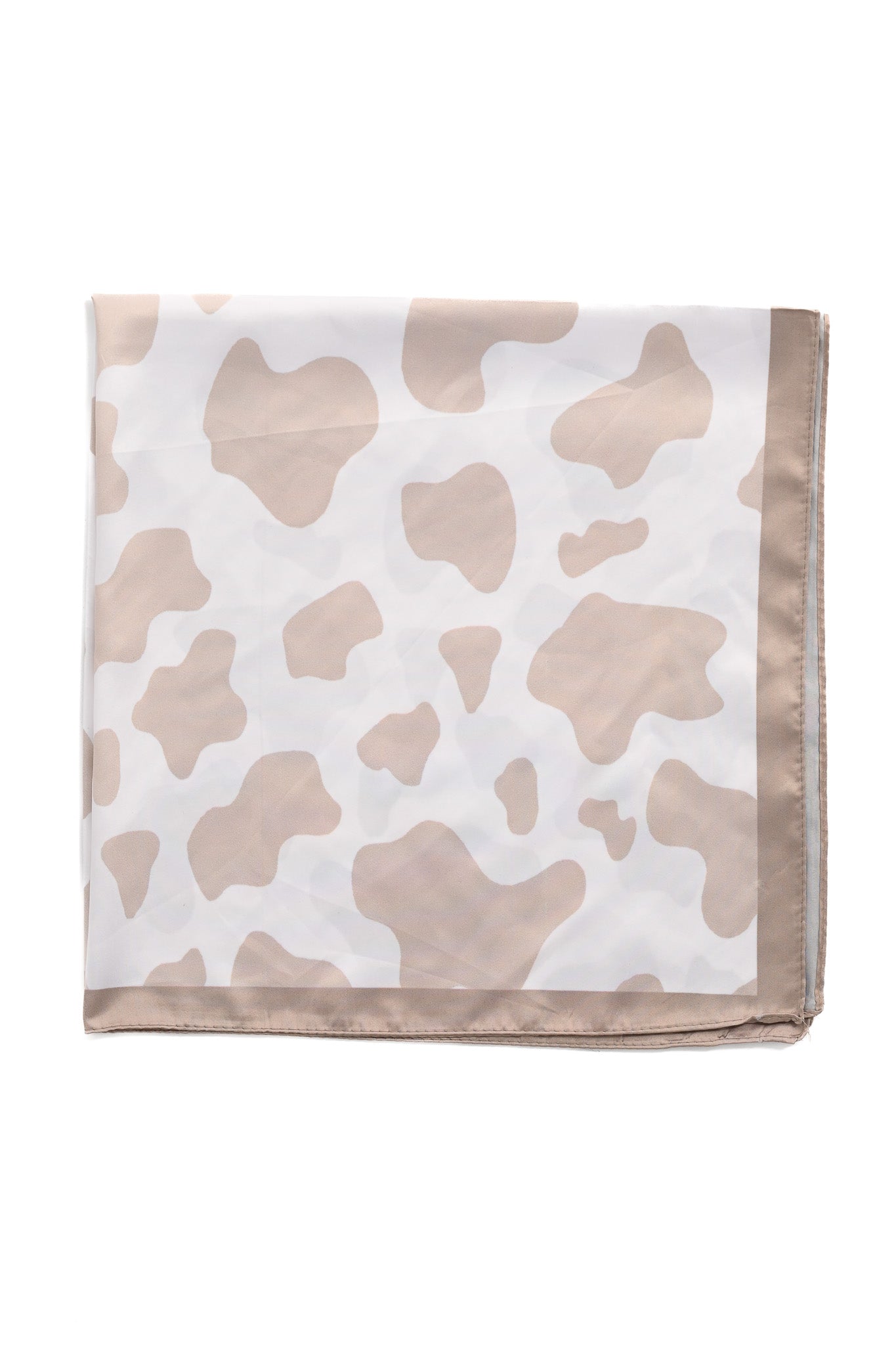 Kort sjaaltje met koeienvlekken beige