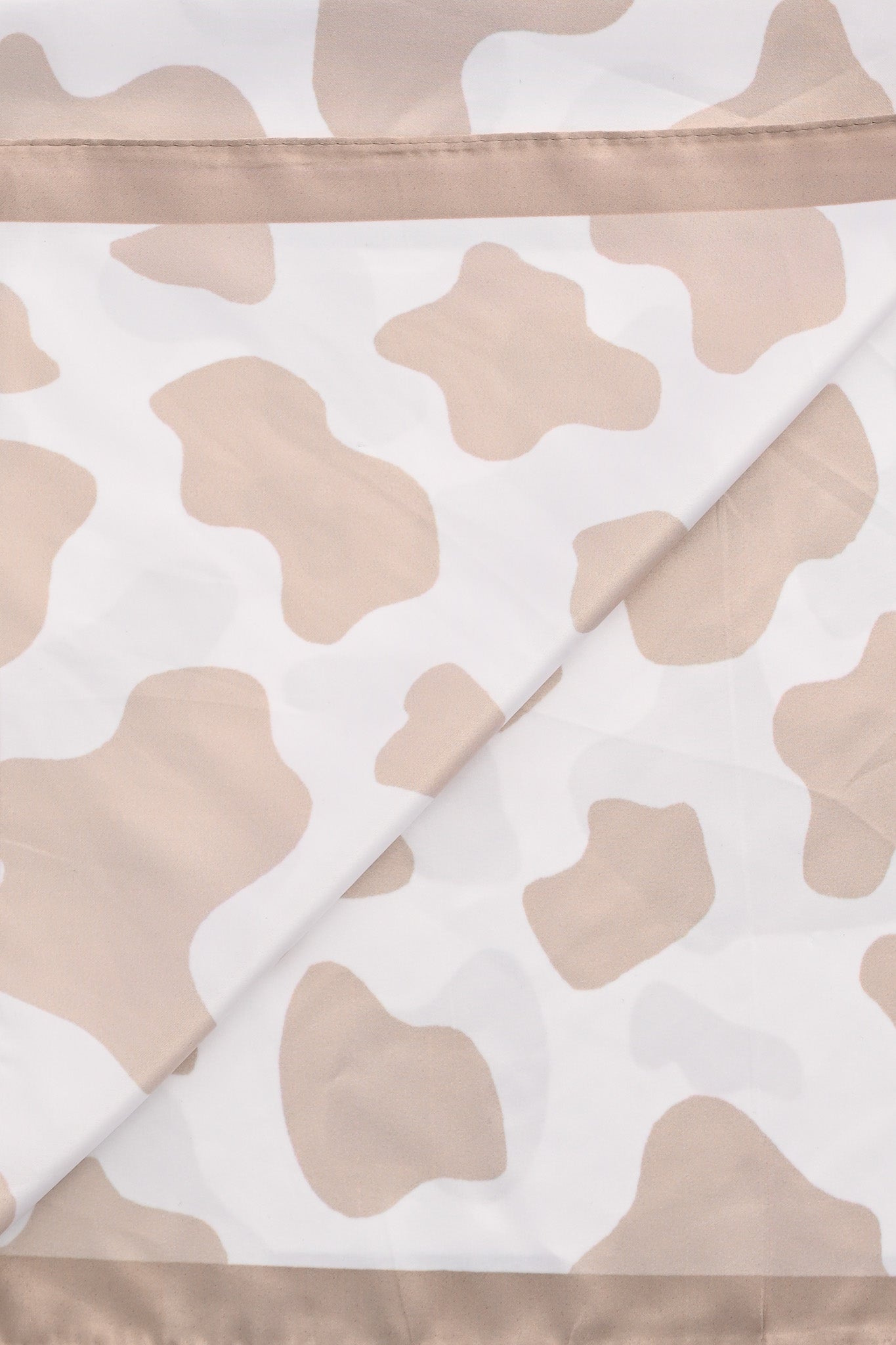 Kort sjaaltje met koeienvlekken beige