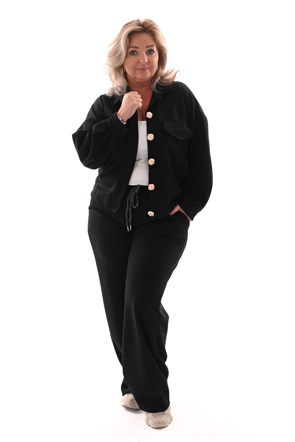 Tweedelig pak blouse met borstzakken en knopen zwart