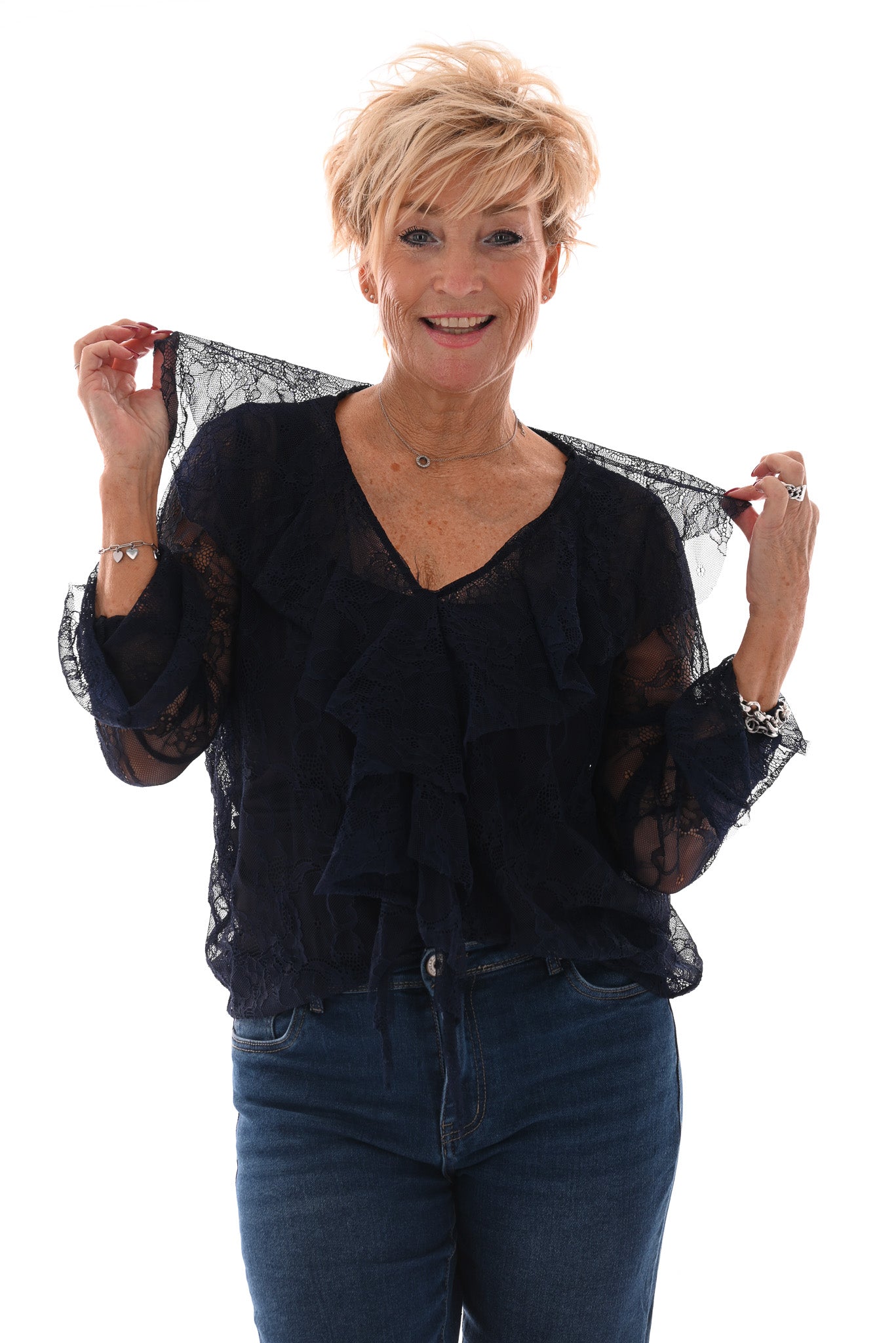 Kanten top roezel v-hals en trompetmouwen marineblauw
