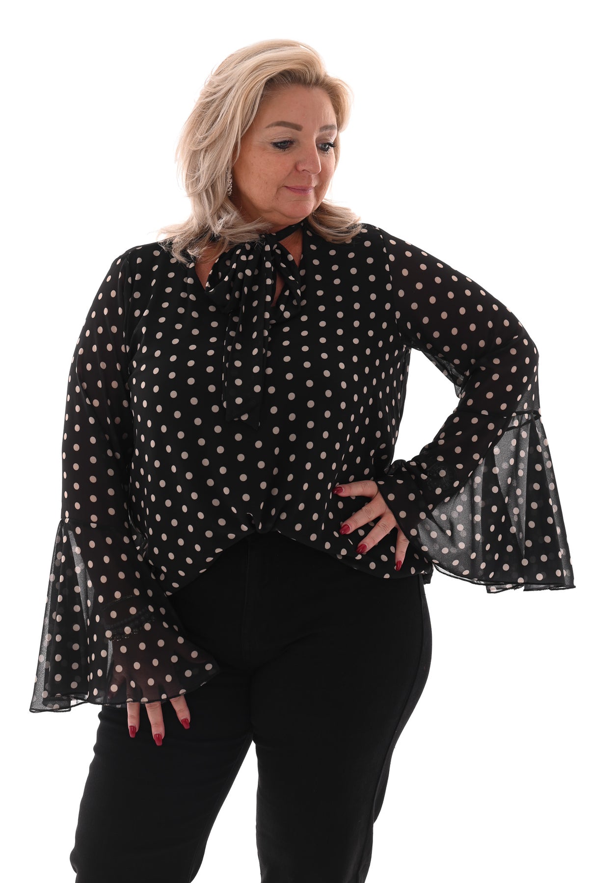 Top dots met strik en trompetmouwen zwart