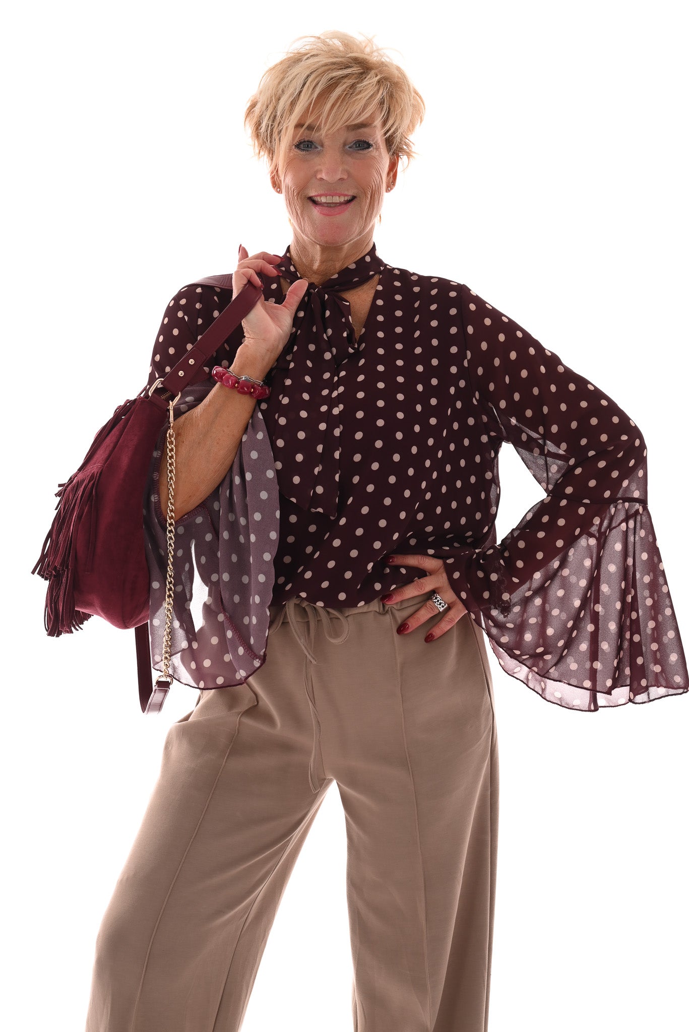 Top dots met strik en trompetmouwen aubergine
