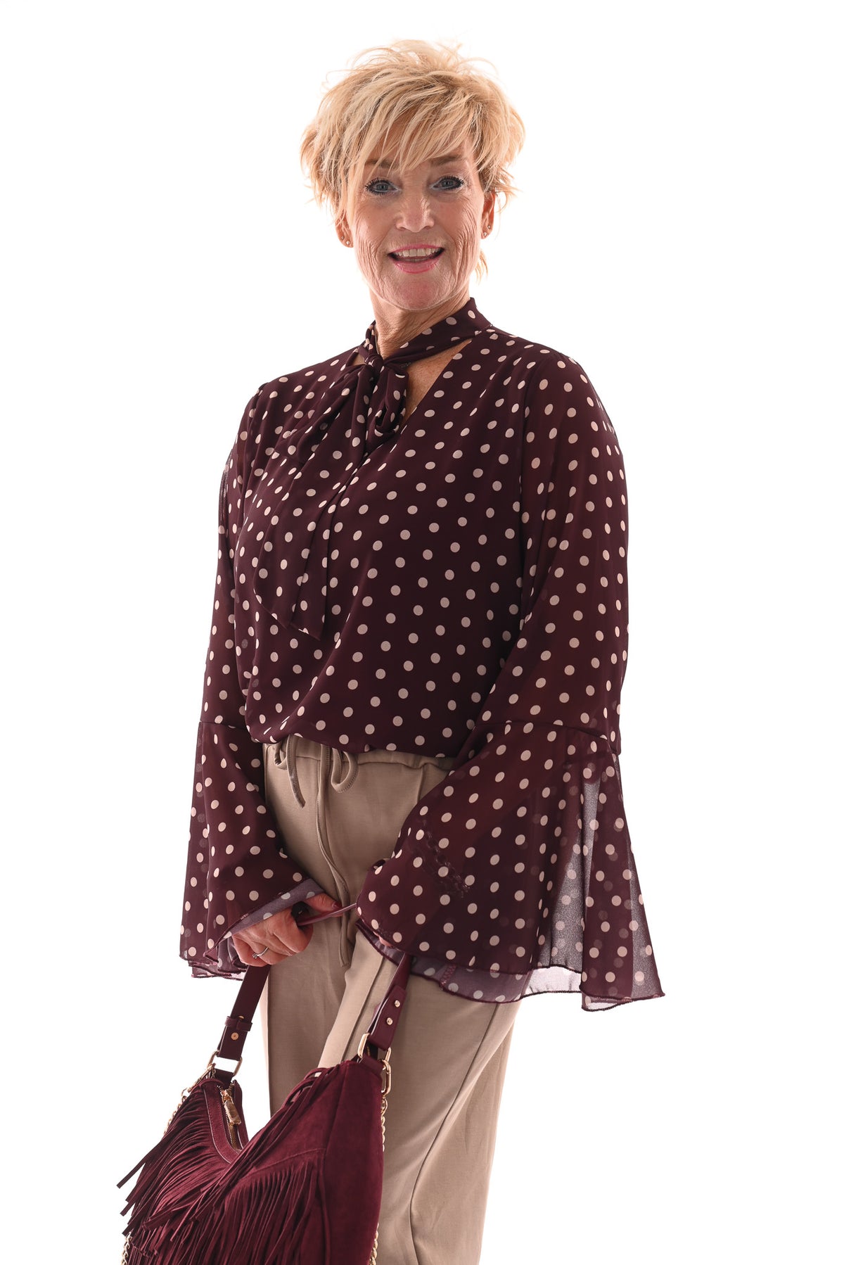 Top dots met strik en trompetmouwen aubergine
