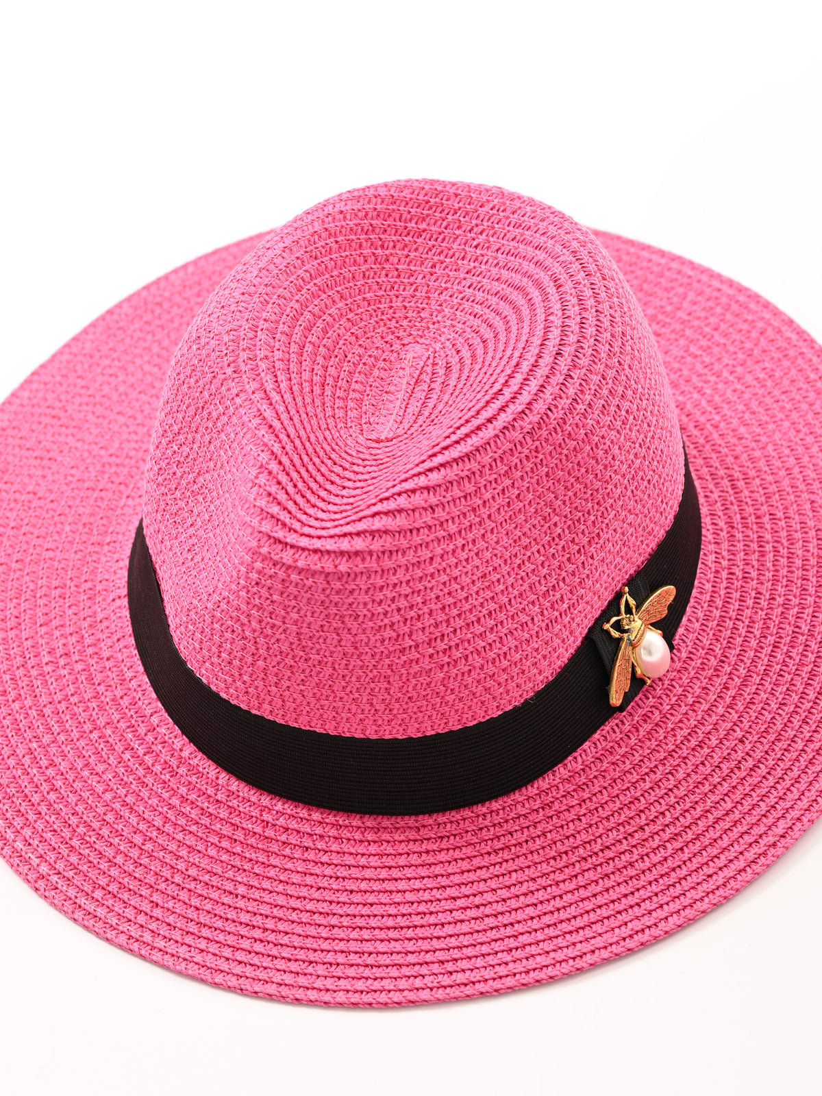 Hoed met bij fuchsia