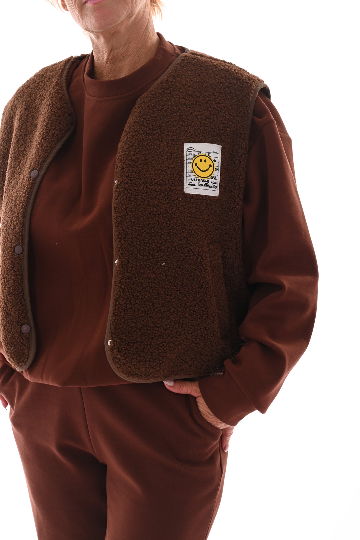 Gilet teddy smiley bruin