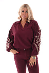 Blouse v-hals borduur op de mouwen bordeaux