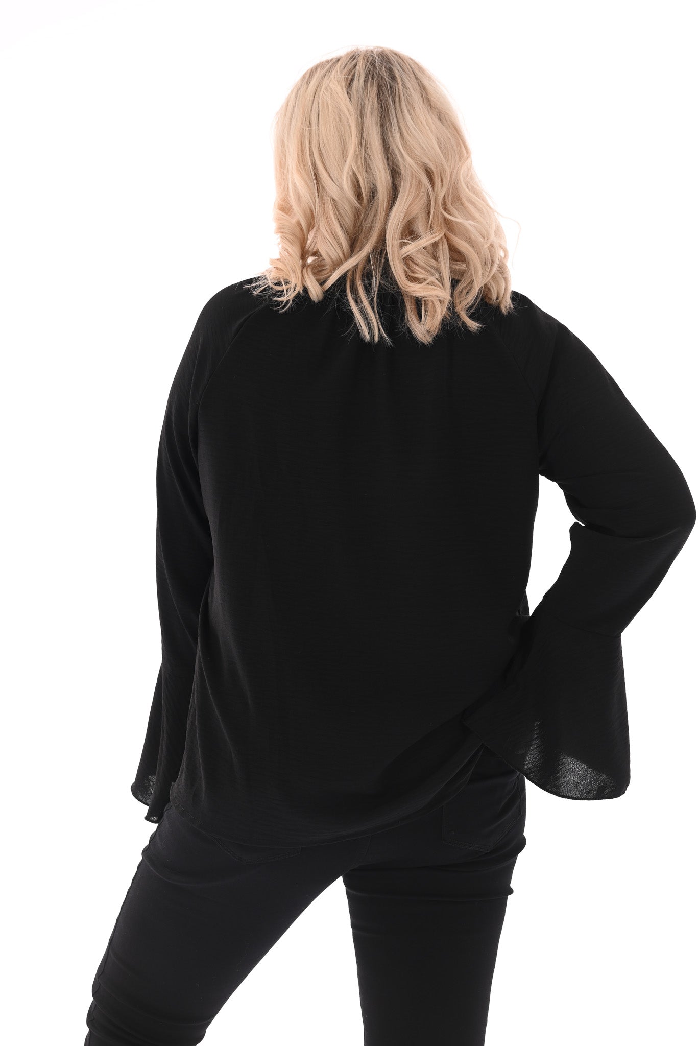 Blouse met roezels en trompetmouwen zwart