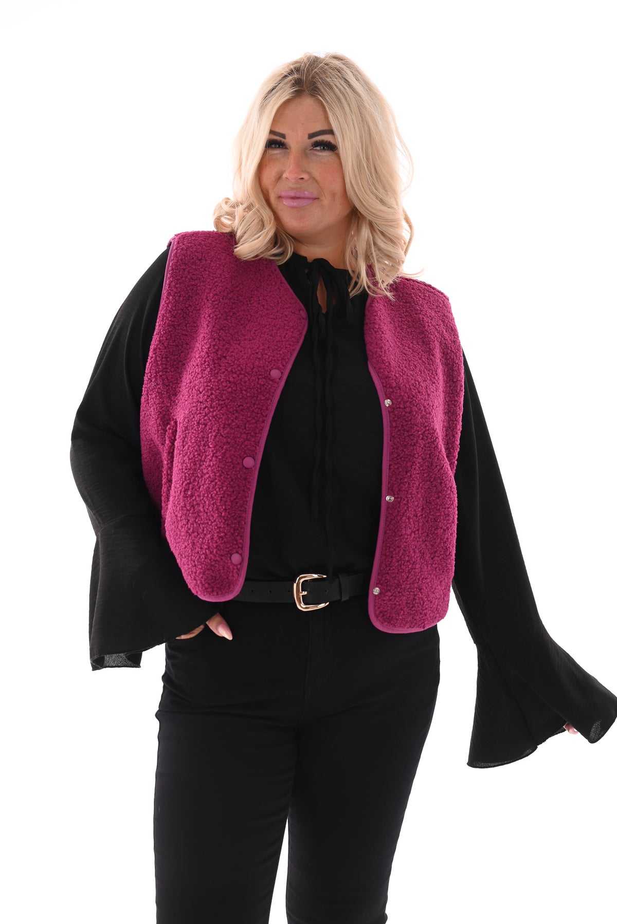 Blouse met roezels en trompetmouwen zwart
