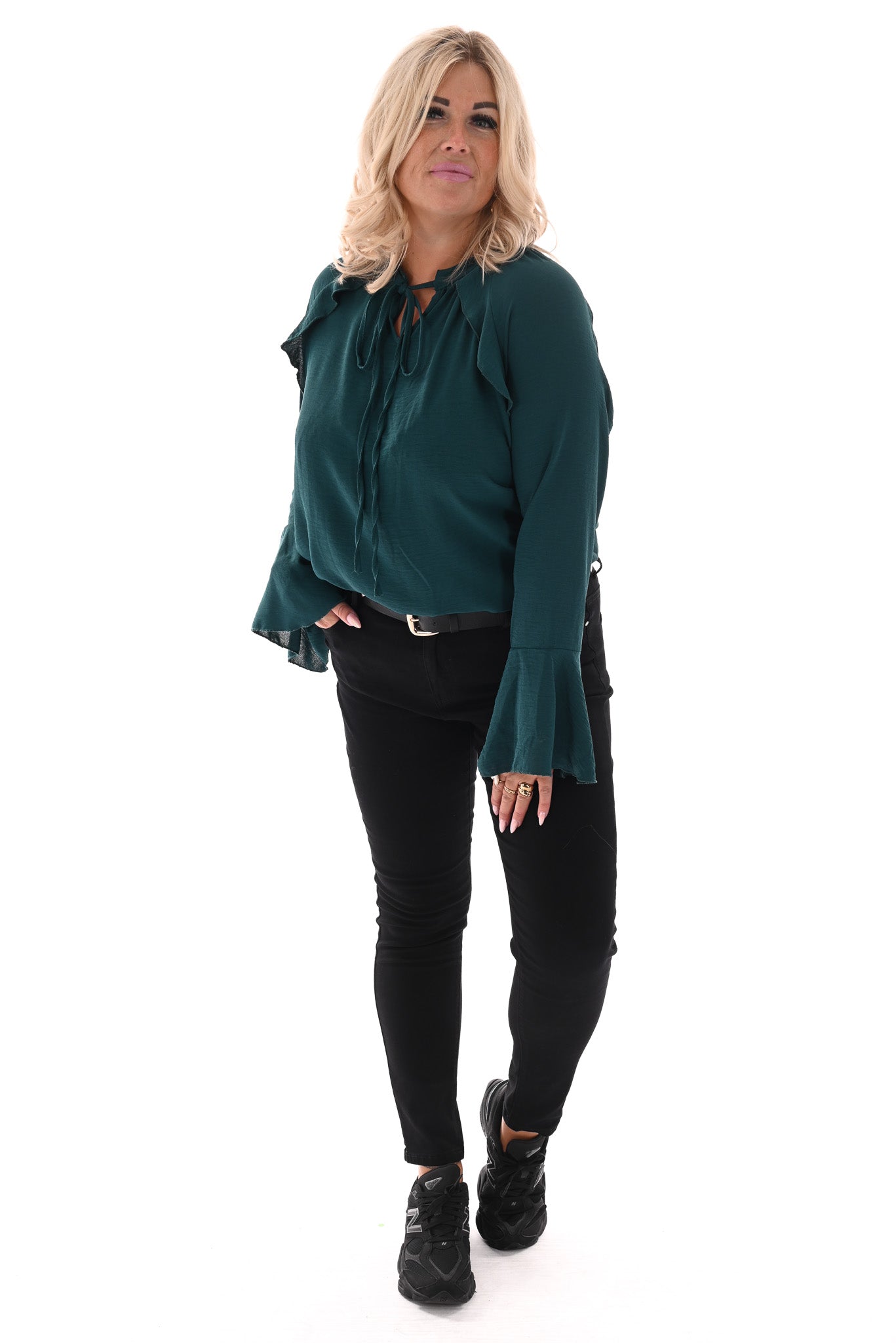 Blouse met roezels en trompetmouwen flessengroen