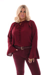 Blouse met roezels en trompetmouwen bordeaux
