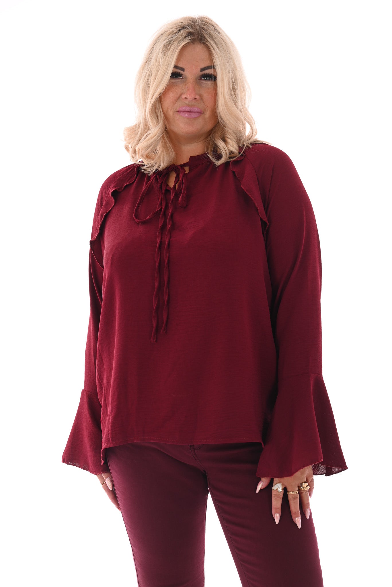 Blouse met roezels en trompetmouwen bordeaux
