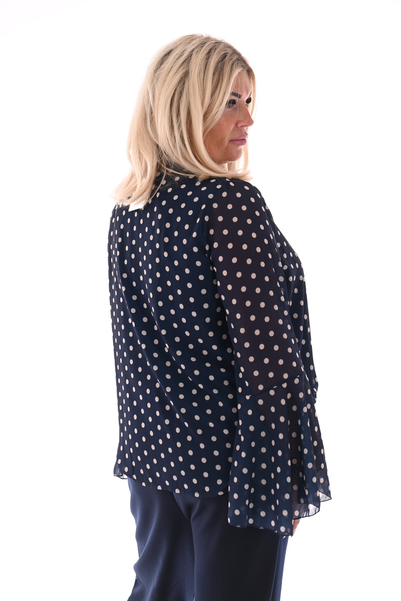 Top dots met strik en trompetmouwen marineblauw