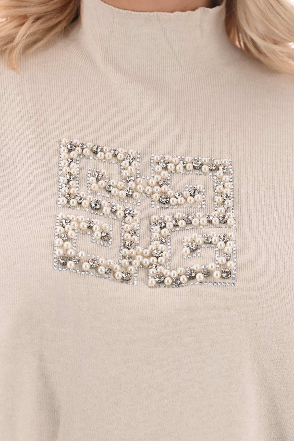 Trui met glitters en parels creme