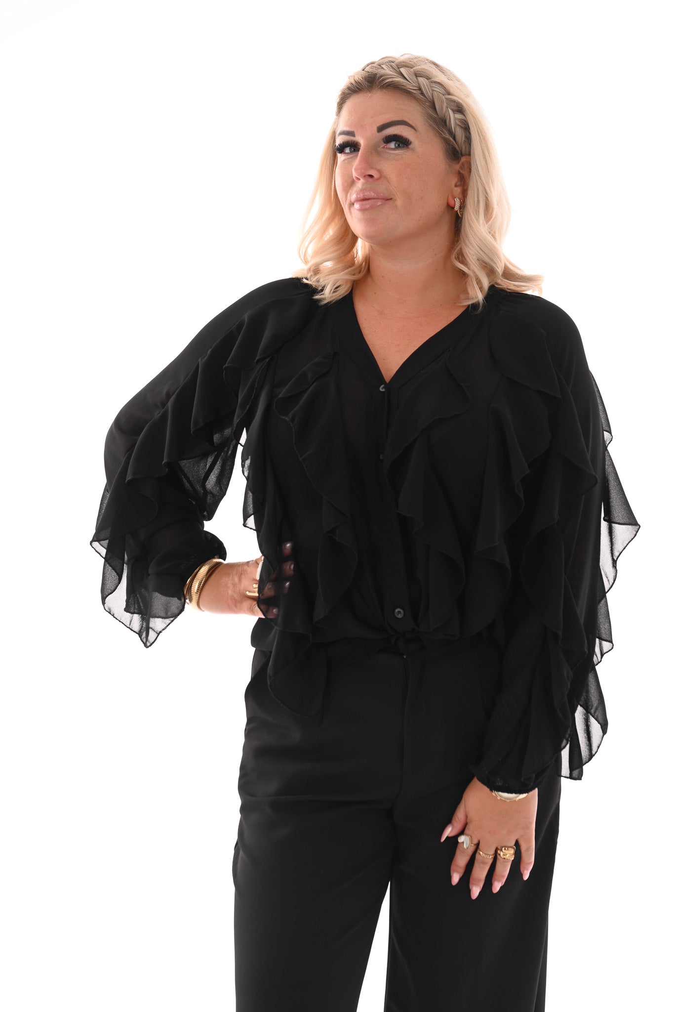 Doorknoop blouse ruffels uni zwart