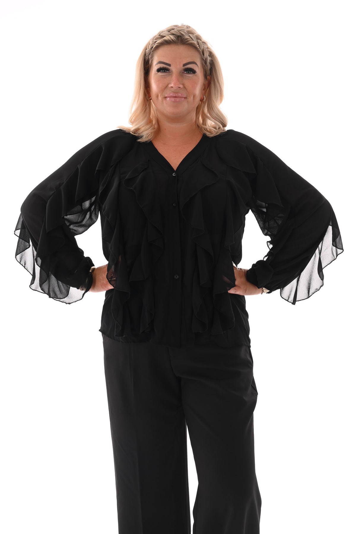 Doorknoop blouse ruffels uni zwart