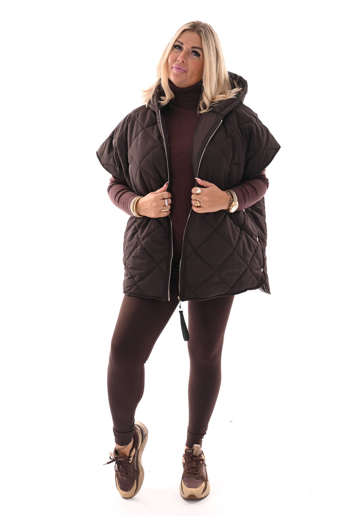 Gewatteerde ponchojas met capuchon donkerbruin