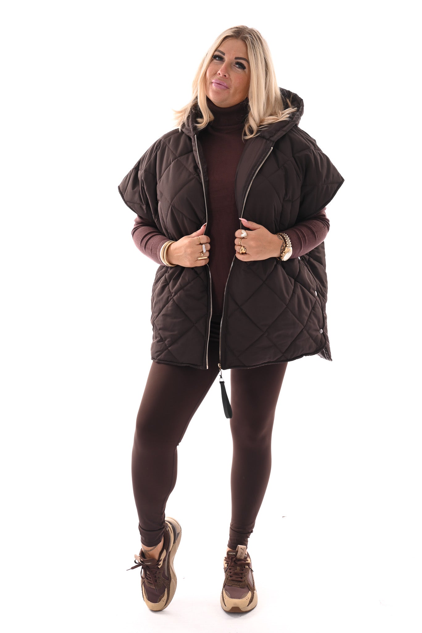 Gewatteerde ponchojas met capuchon donkerbruin