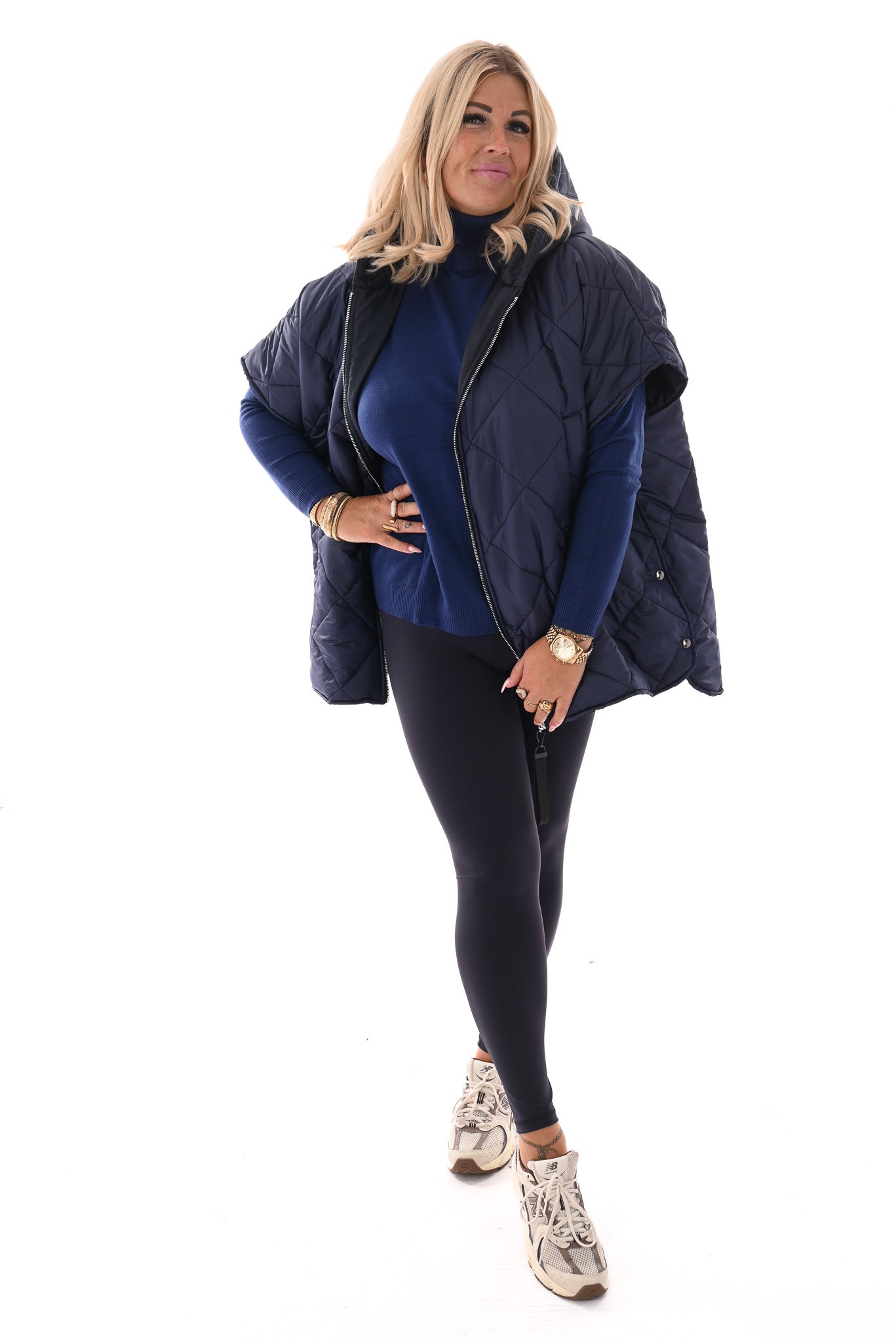 Gewatteerde ponchojas met capuchon marineblauw